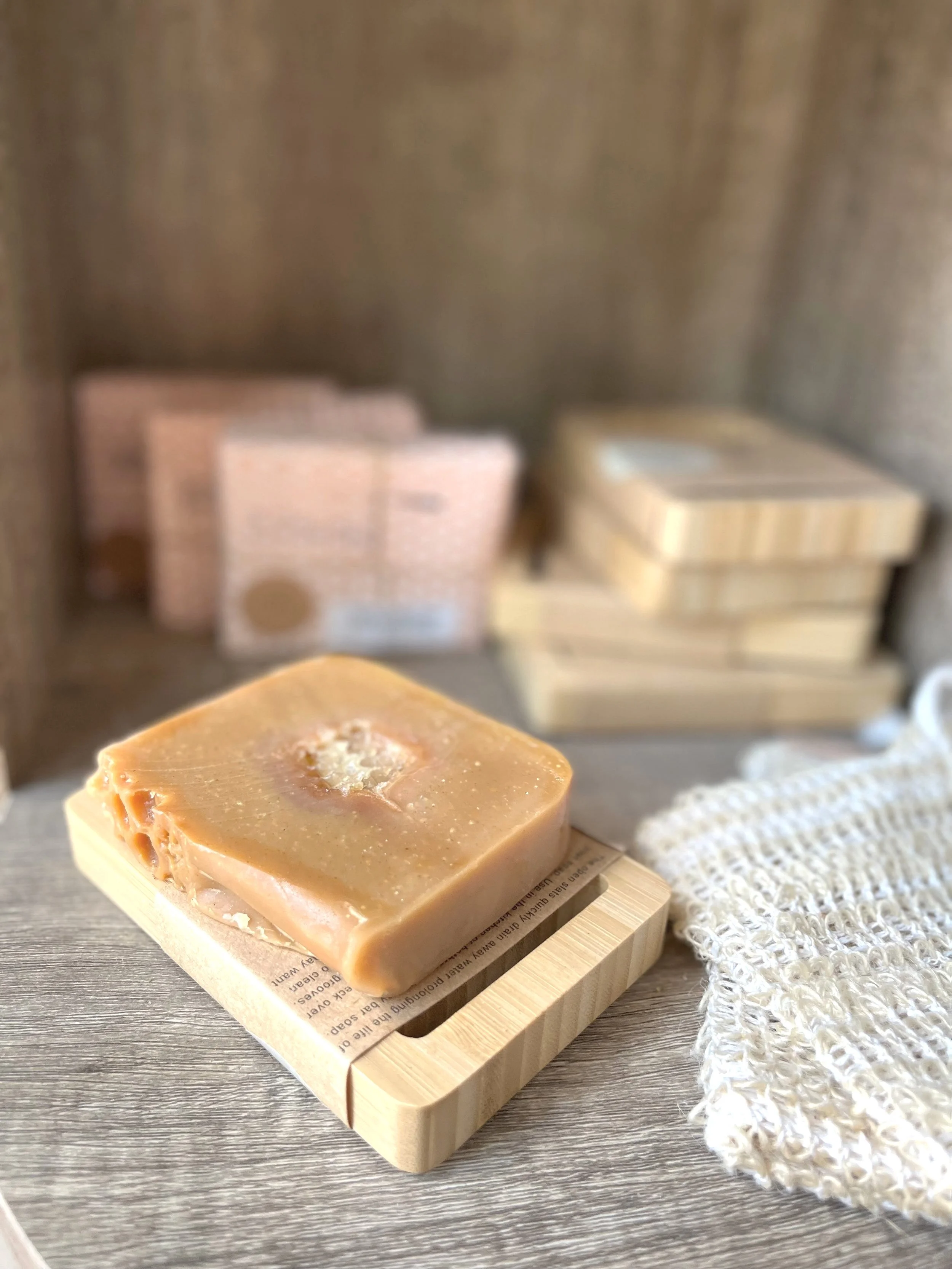 Soap sitting on wooden holder