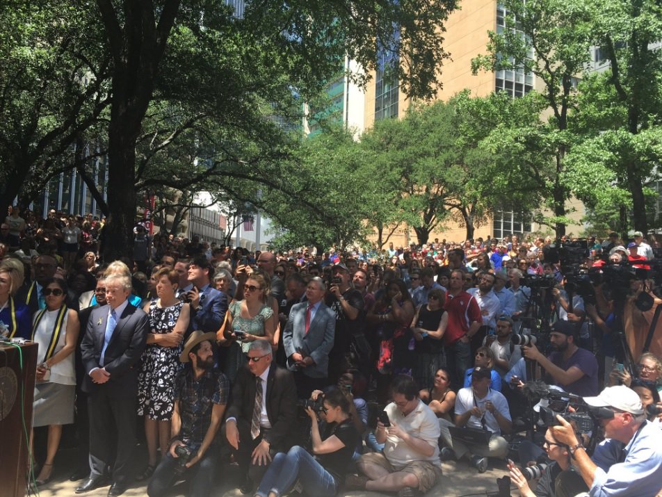  In 2016, following the tragic events of July 7, the Dallas community gathers at Thanks-Giving Square for an interfaith vigil, reaffirming the Square’s role as a place of unity, reflection, and healing in times of crisis. 