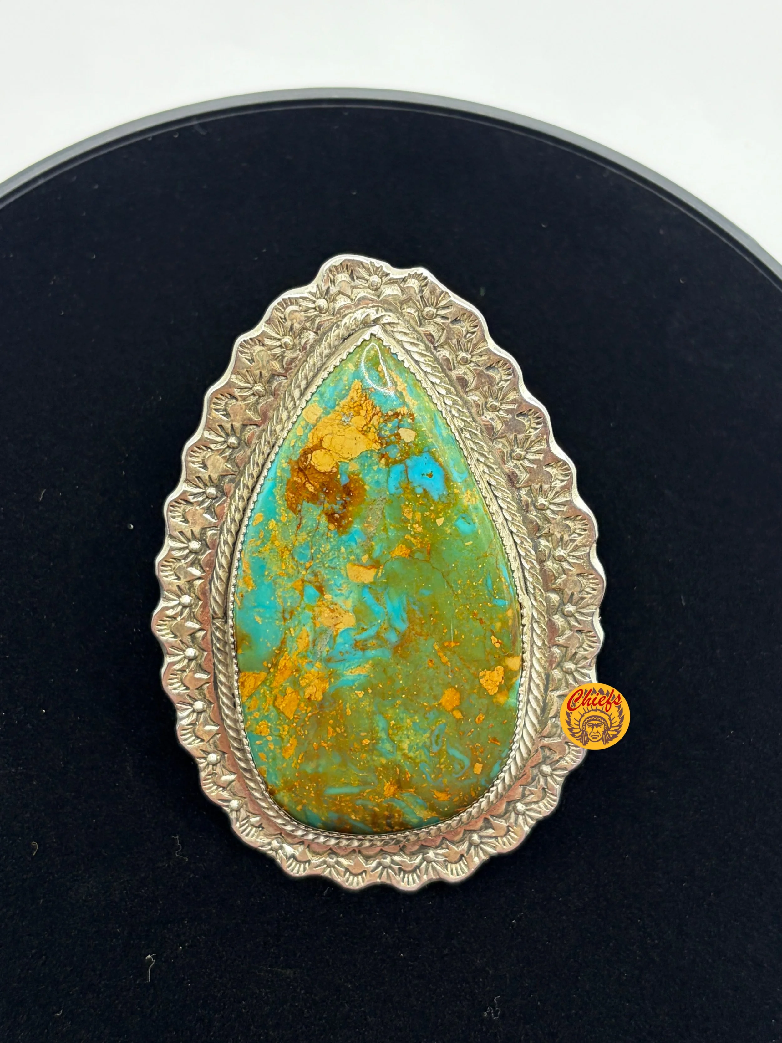 Ceremonial Kingman Turquoise Ring

Handcrafted with a stunning ceremonial Kingman turquoise stone, this adjustable ring features vivid blue-green hues with natural golden-brown matrix, honoring the spirit and strength of the stone. Set in solid sterl