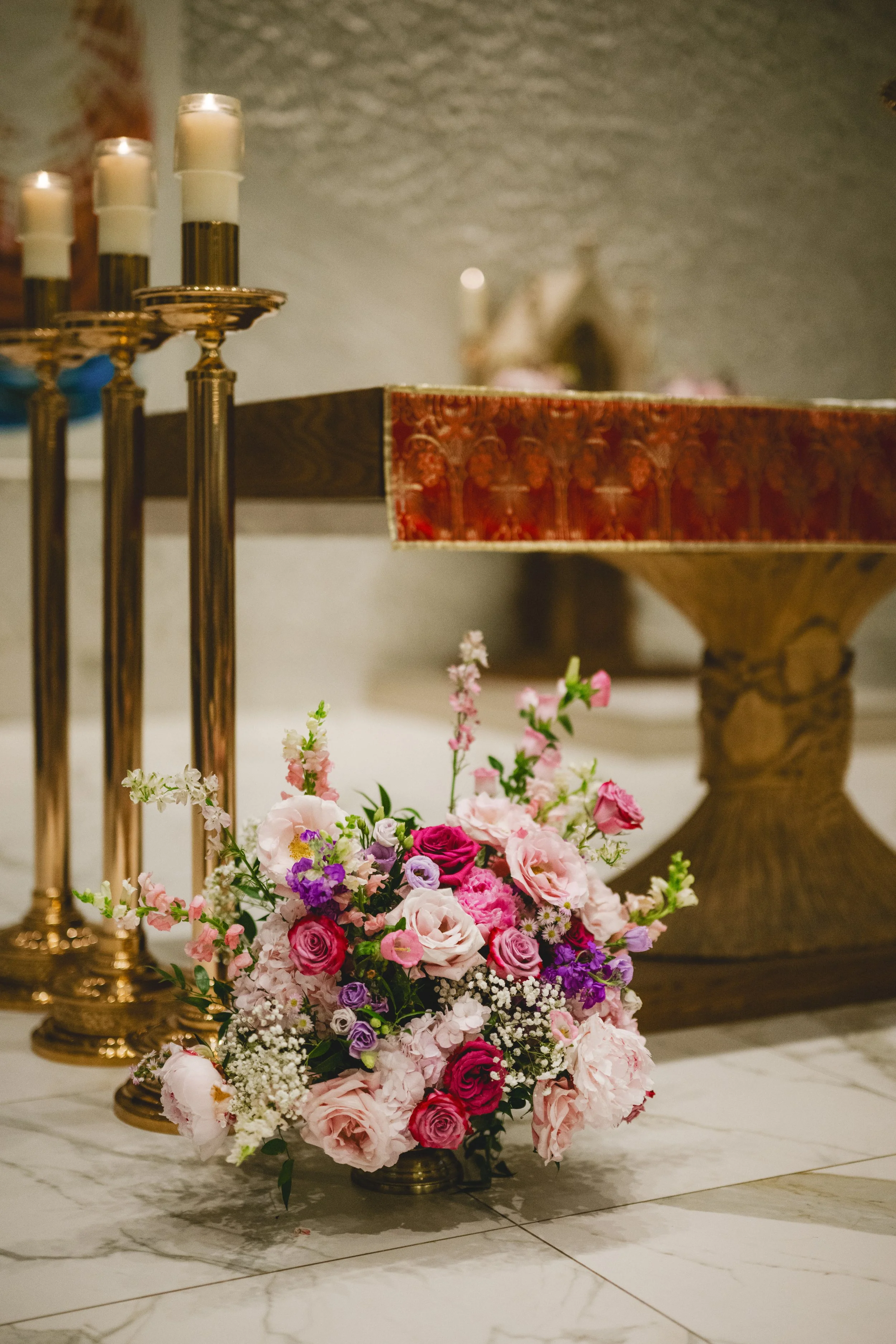 A pink and purple ceremony flower arrangements, Toronto wedding flowers