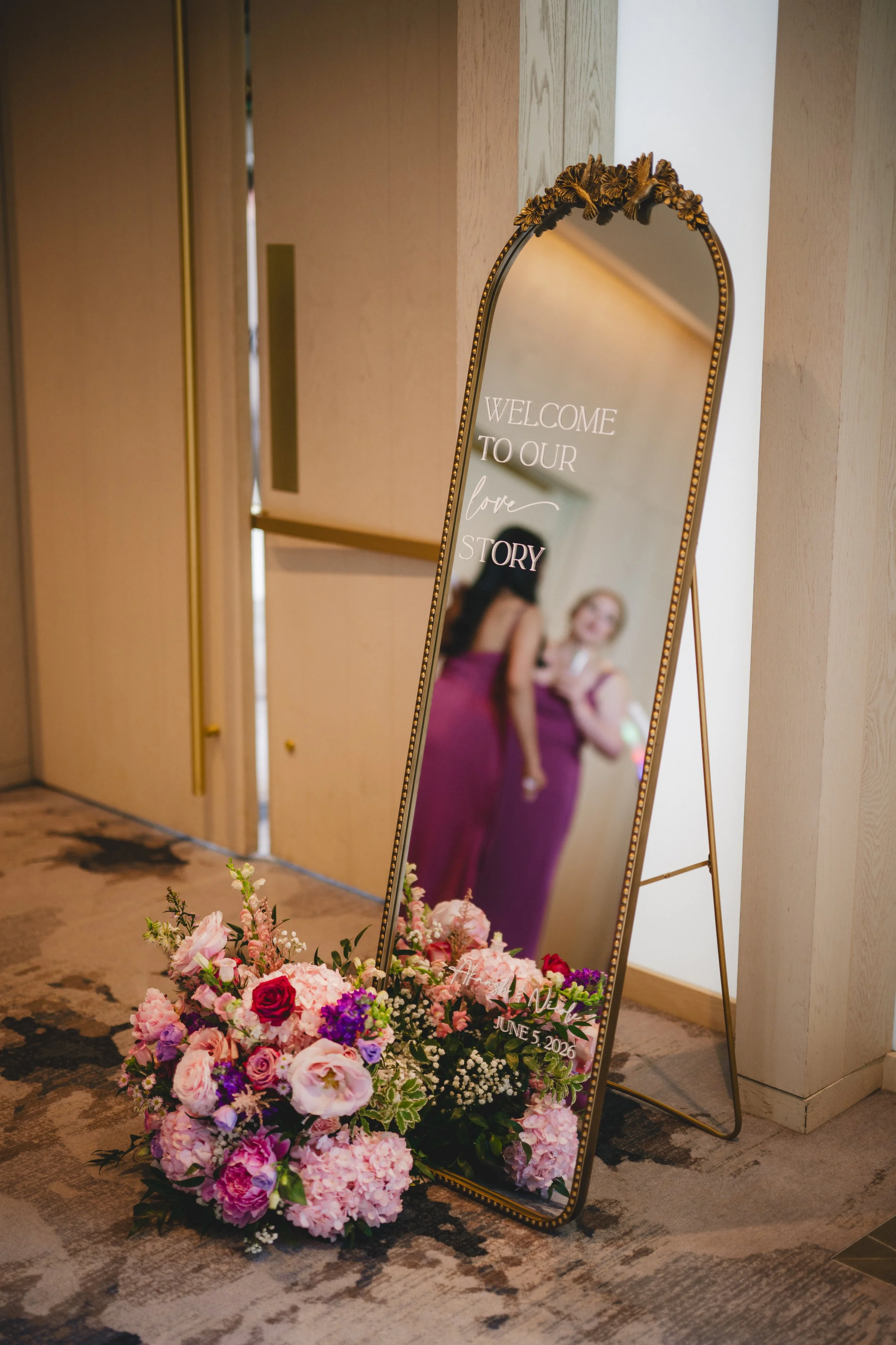 Pink and purple wedding flowers at the pearle hotel and spa