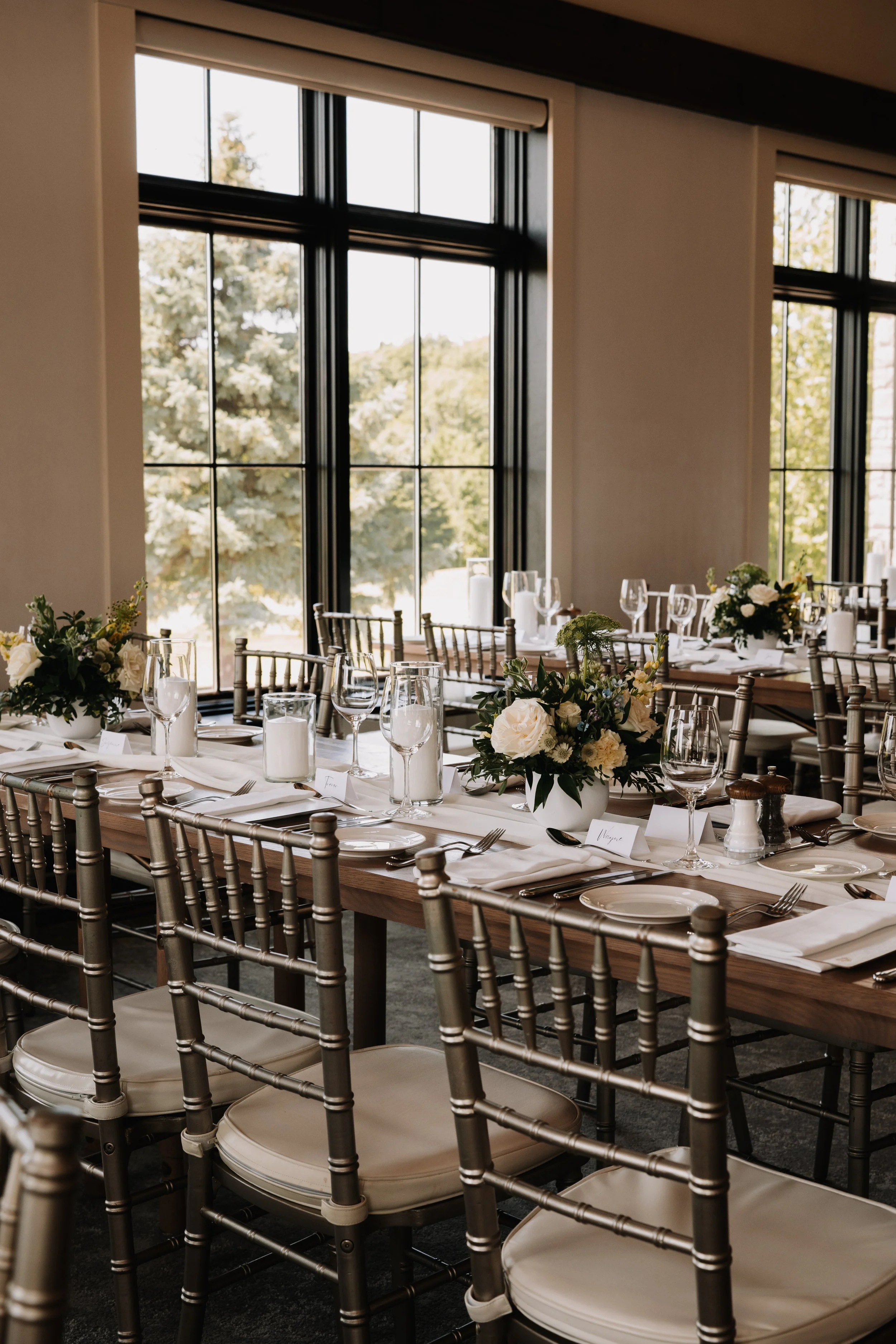 the Rose room at whistle bear golf course wedding. Flowers in whites, creams and blues