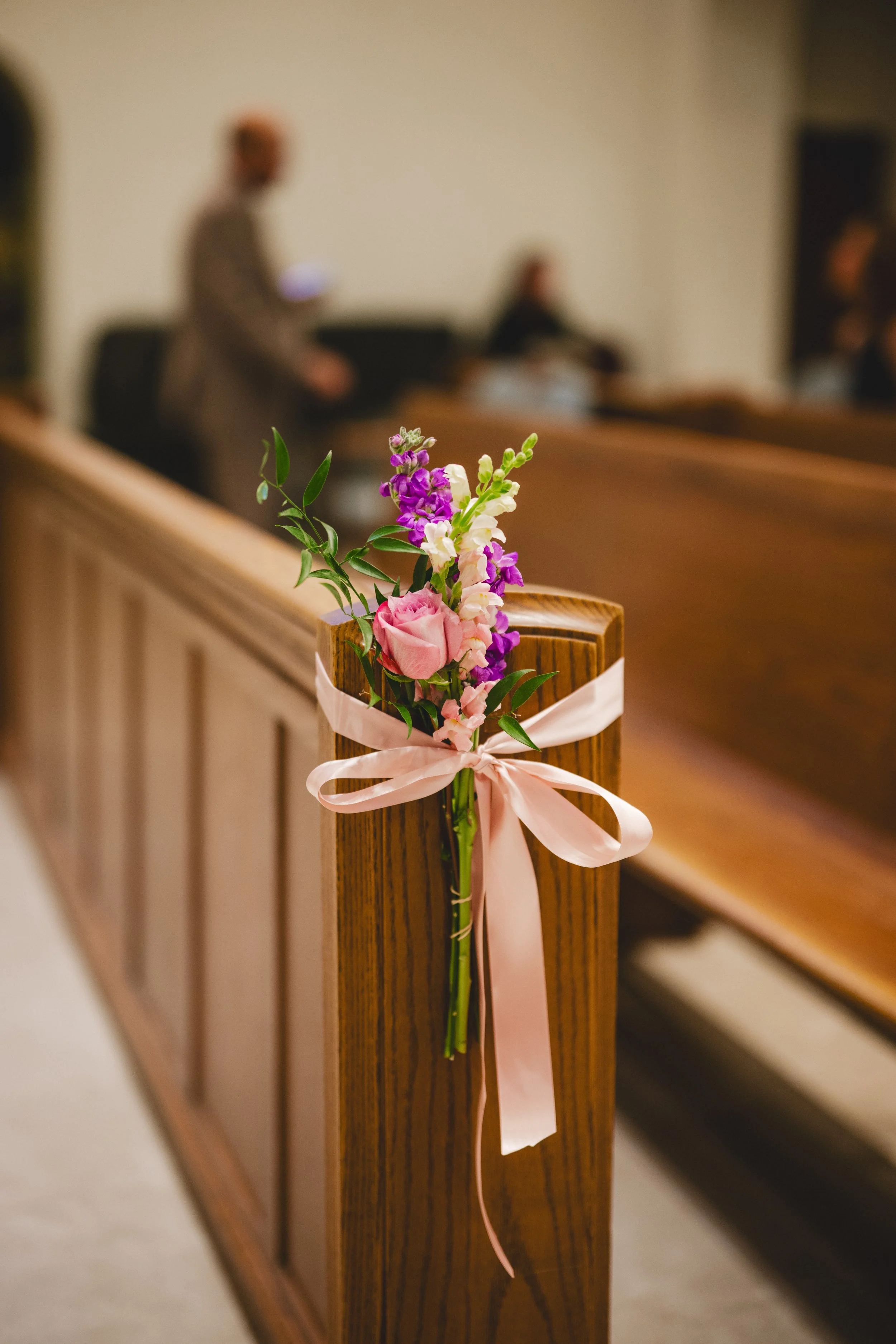 Pink and purple pew flowers, Toronto wedding flowers