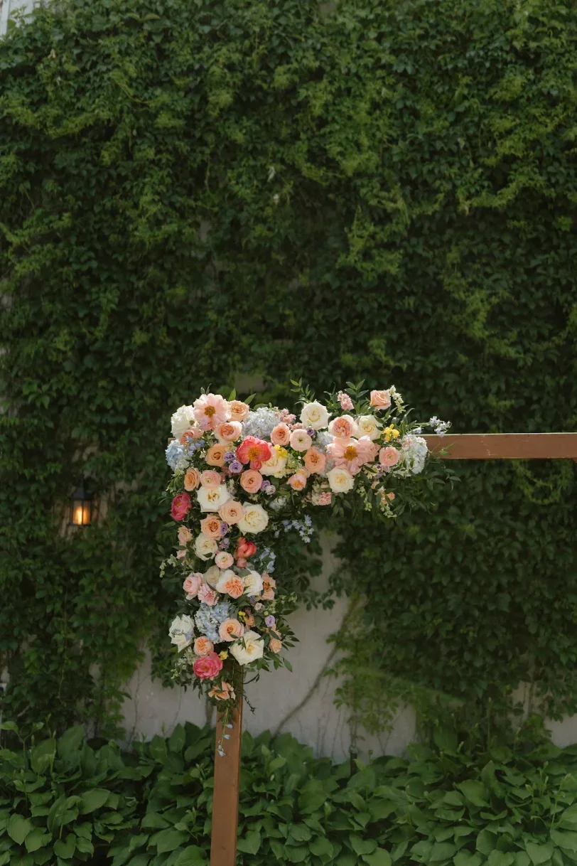 A floral arch full of bright spring colours at Waterstone Estate and Farms