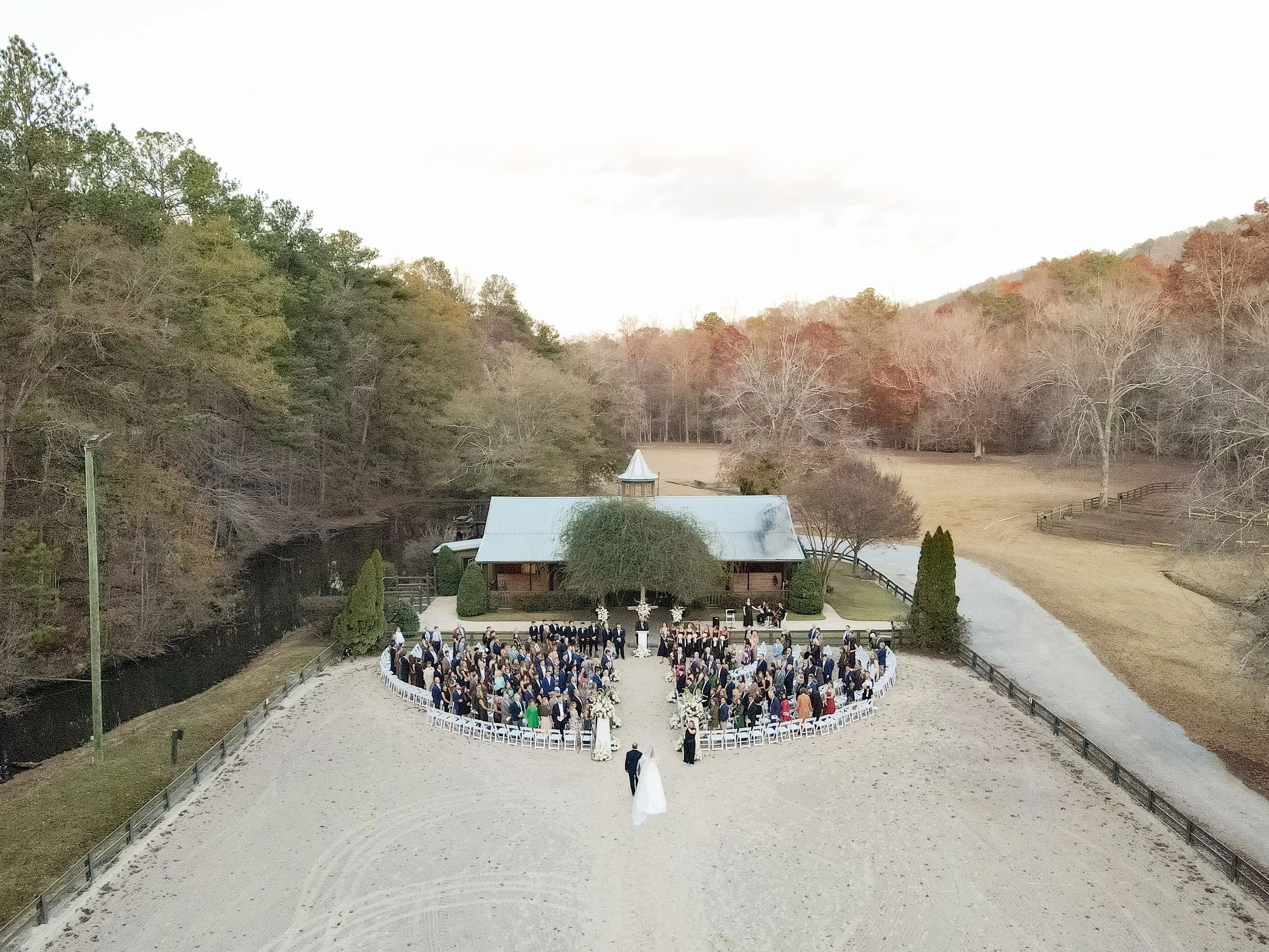 A_Windwood_Wedding_Outdoor_Ceremony_Arena_Semicircle_Seating_Aerial_View_Beautiful_Planning_Barn.jpg