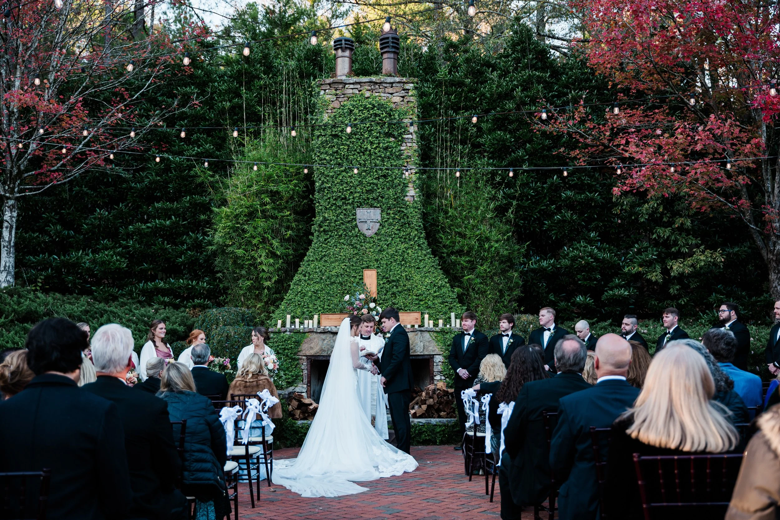 Windwood_Wedding_Fall_Ceremony_Outdoor_Venue_Fireplace_Courtyard.jpg