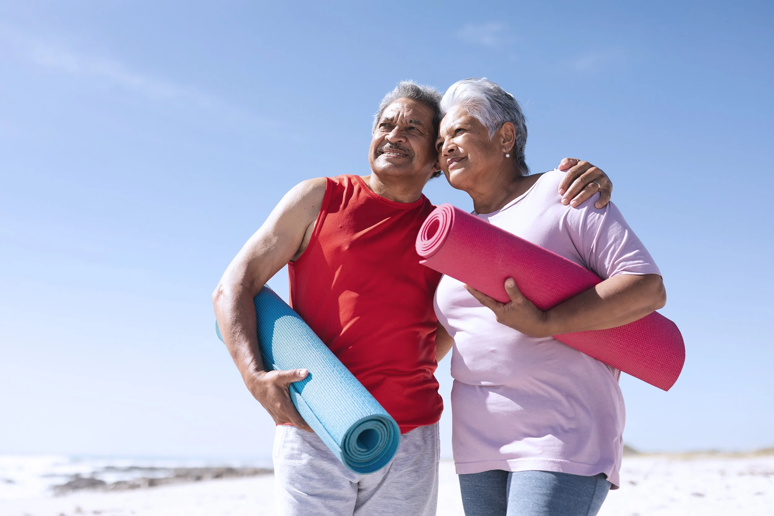 Senior_Couple_Enjoying_Beach_Yoga_original_3794580 copy.jpg