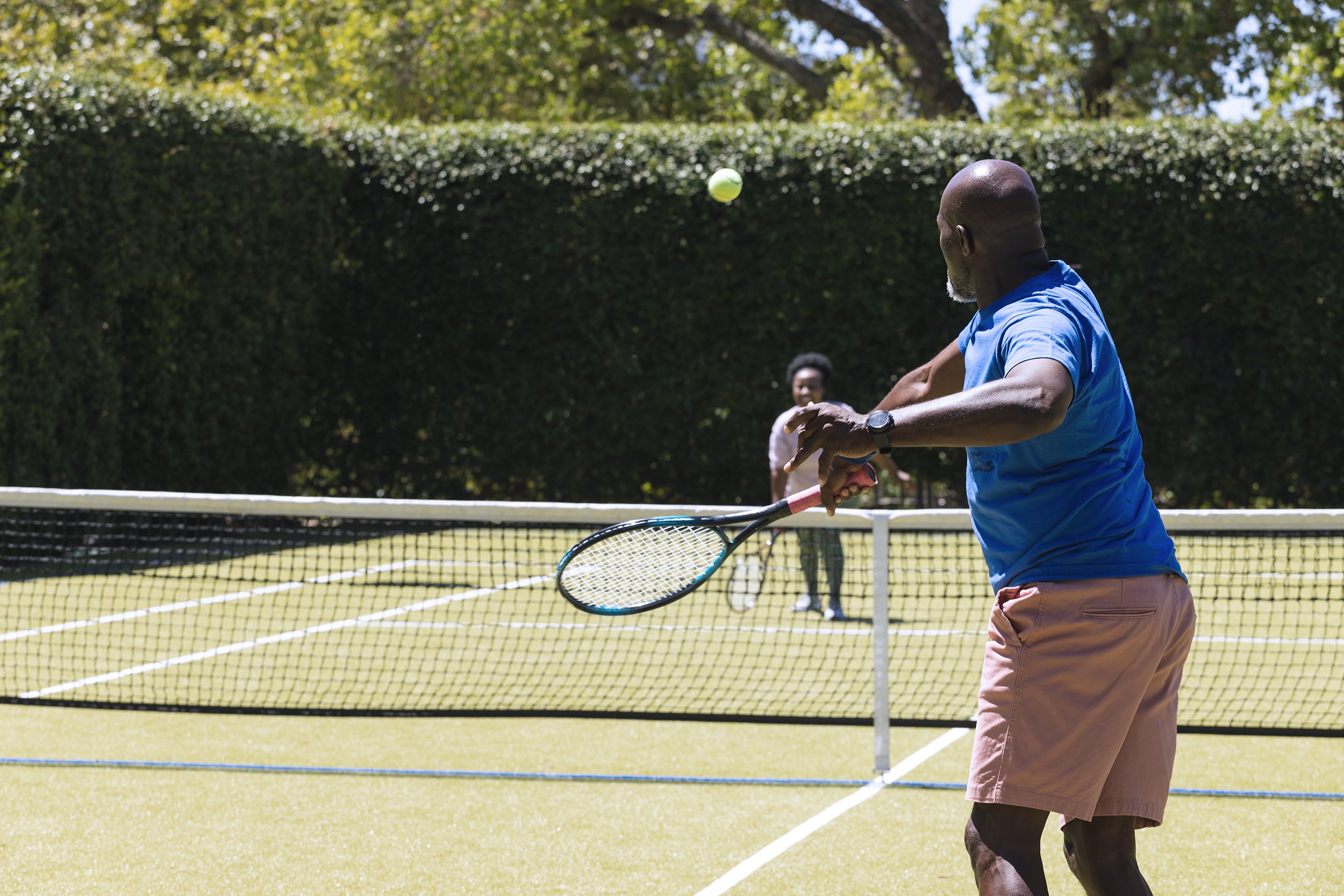 Two_People_Playing_Tennis_Outdoors_original_3794872 copy.jpg