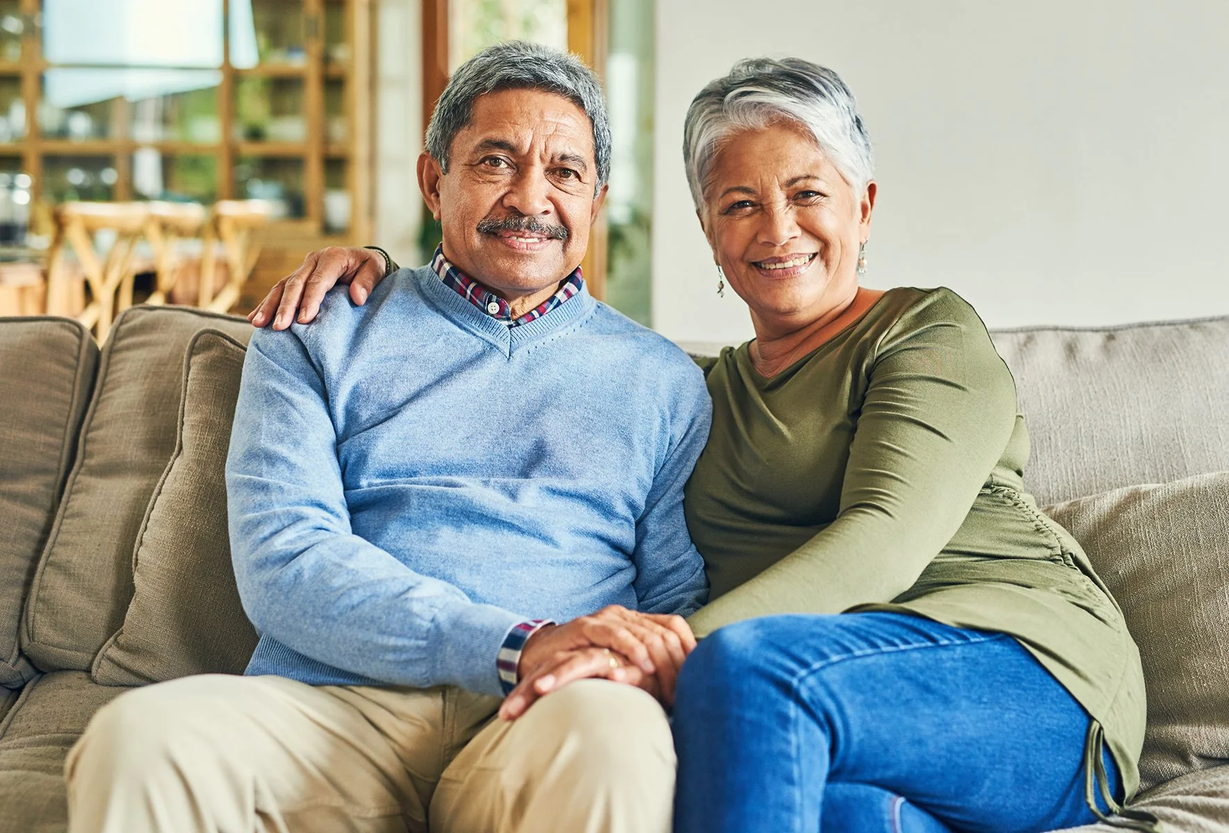 happy-portrait-elderly-couple-sofa-hug-wellness-pleased-successful-retirement-senior-woman-man-love-living-room-commitment-comfort-support-marriage-home.jpg