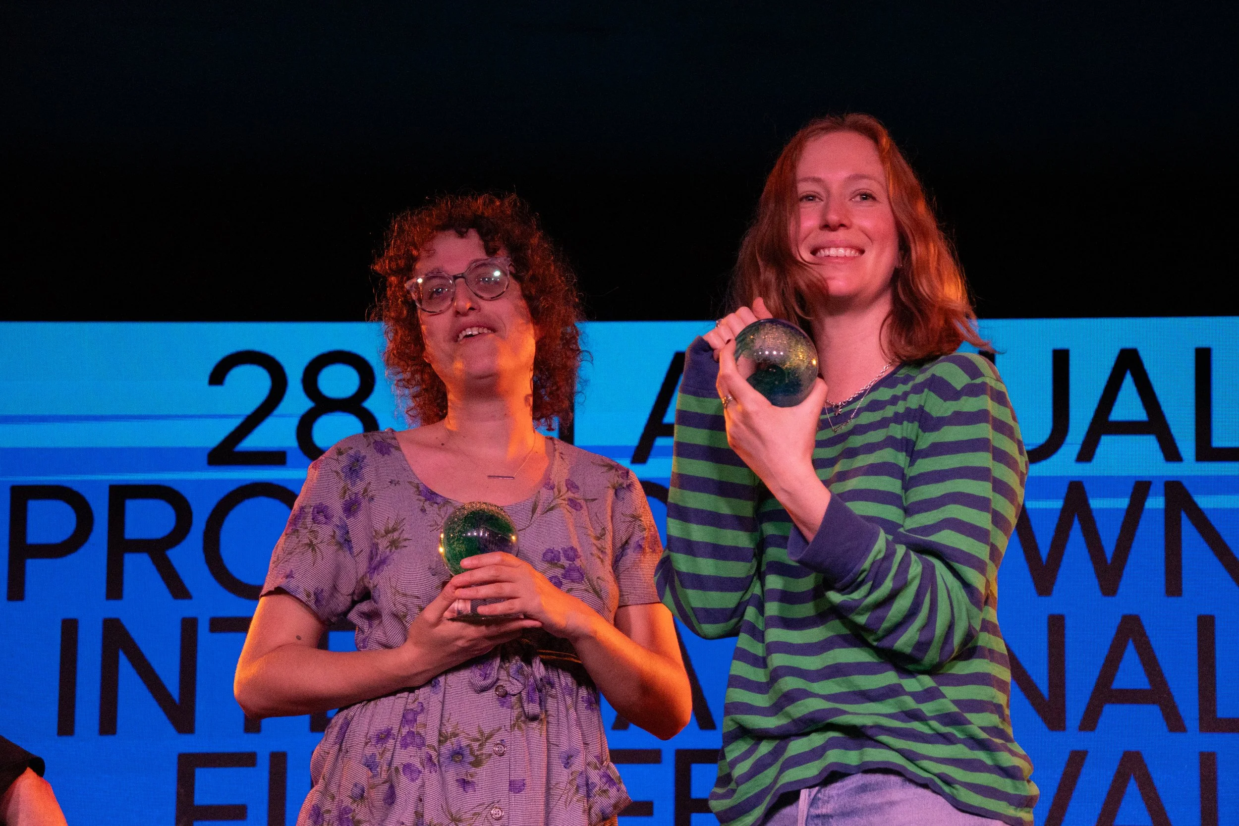 Next Wave Honorees
Hannah Einbinder and filmmaker Jane Schoenbrun accept the PIFF Next Wave Award, recognizing emerging voices shaping contemporary entertainment and cinema.