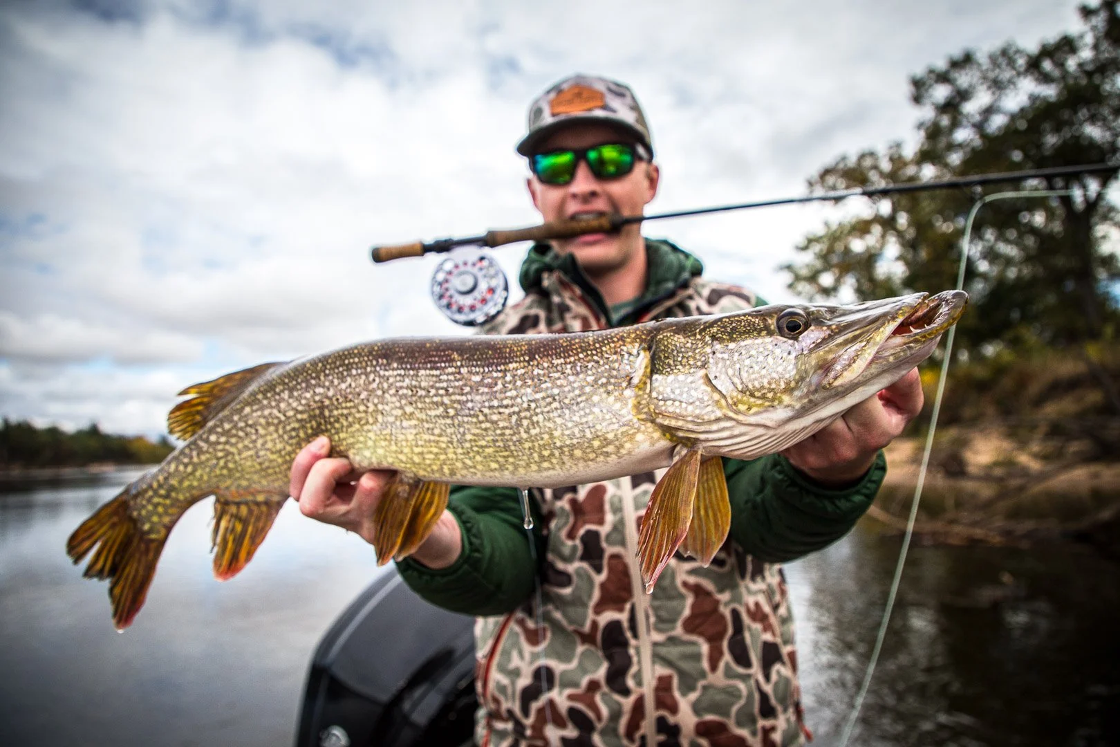 BEAC angler holds a Wisconsin river pike caught in September