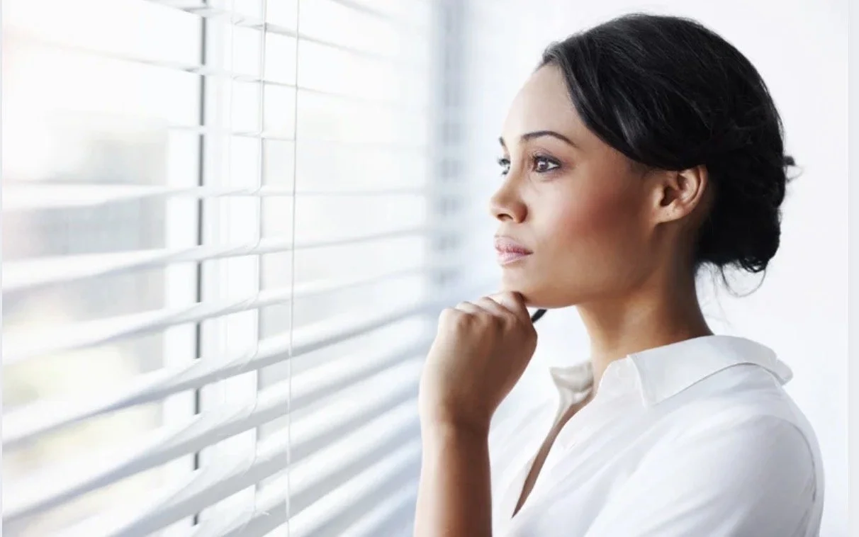 Woman feeling stuck in patterns, Christian therapist Florida, breaking cycles through faith and therapy