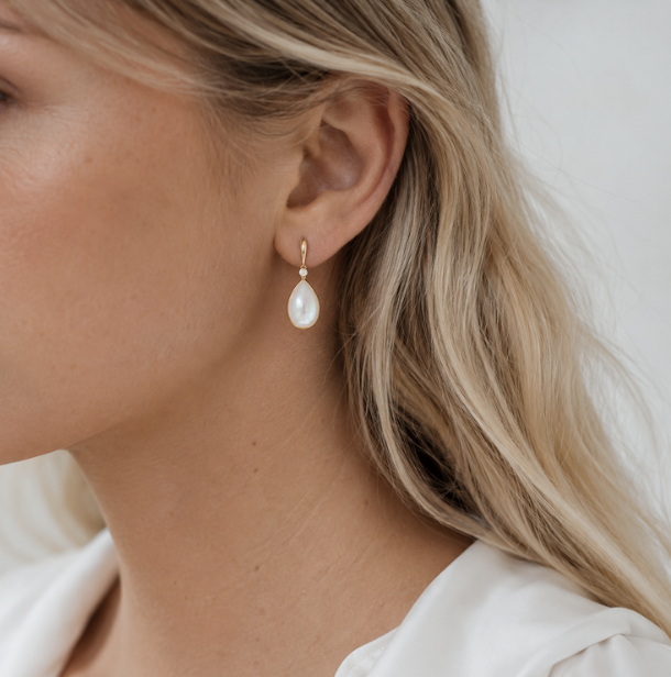 Mother of pearl and diamond earrings in 14k yellow gold as an elegant push present gift for a new mother from Brilliant Fine+Custom Jewelry