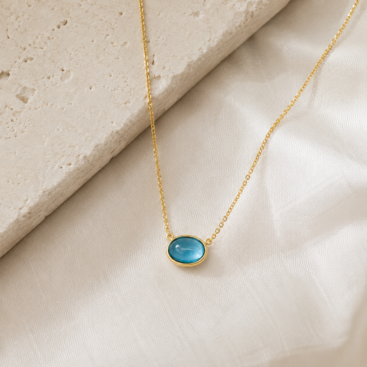 Bezel Set Oval Swiss Blue Topaz Cabochon Necklace 4.png
