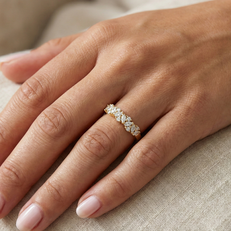 Pear and round shaped cluster diamond half band for adding sparkle and movement to a ring stack from Brilliant Fine+Custom Jewelry.
