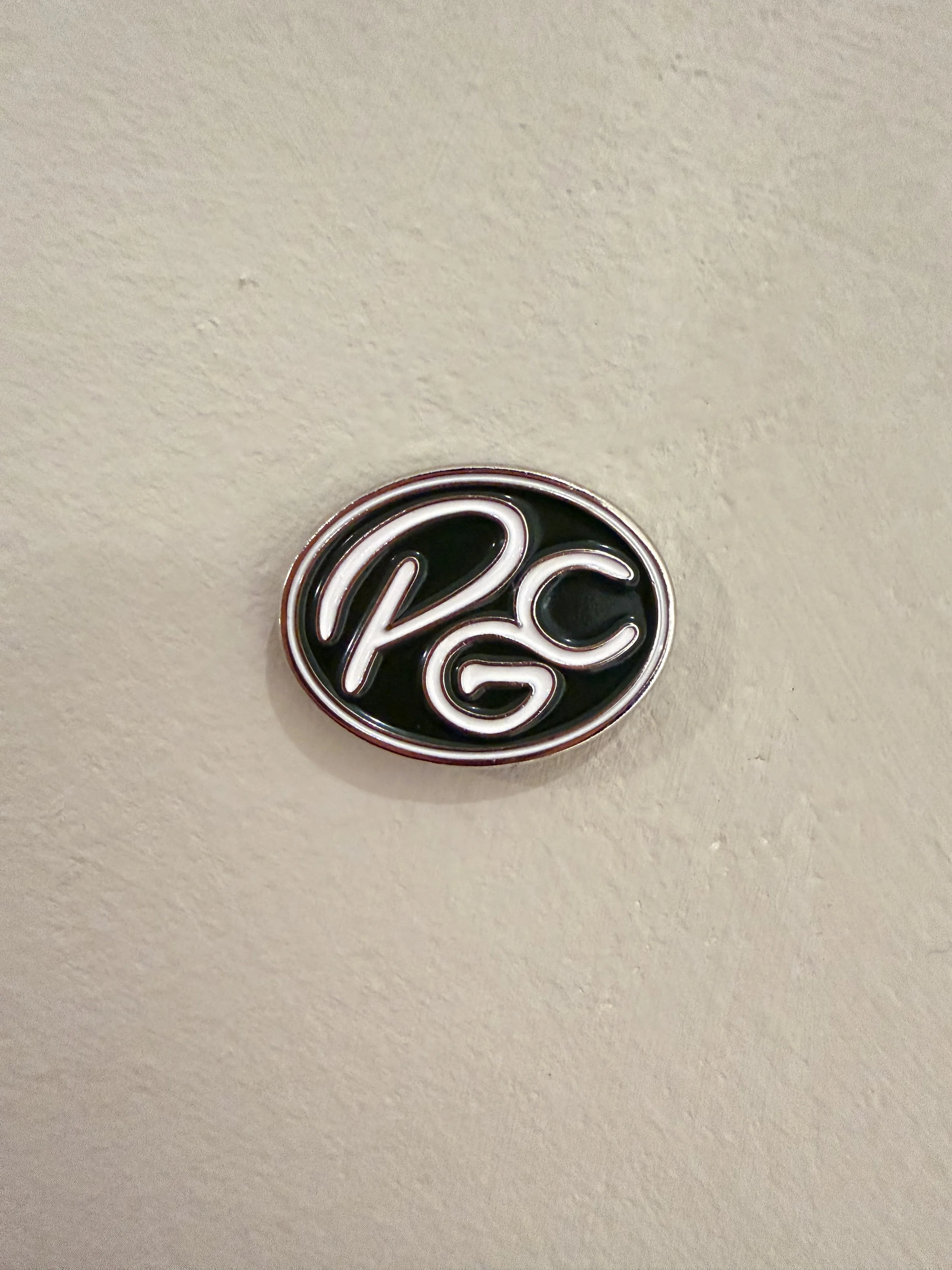 Powerhouse Golf Club Members Marker, PGC brandmark ball marker in metal and enamel