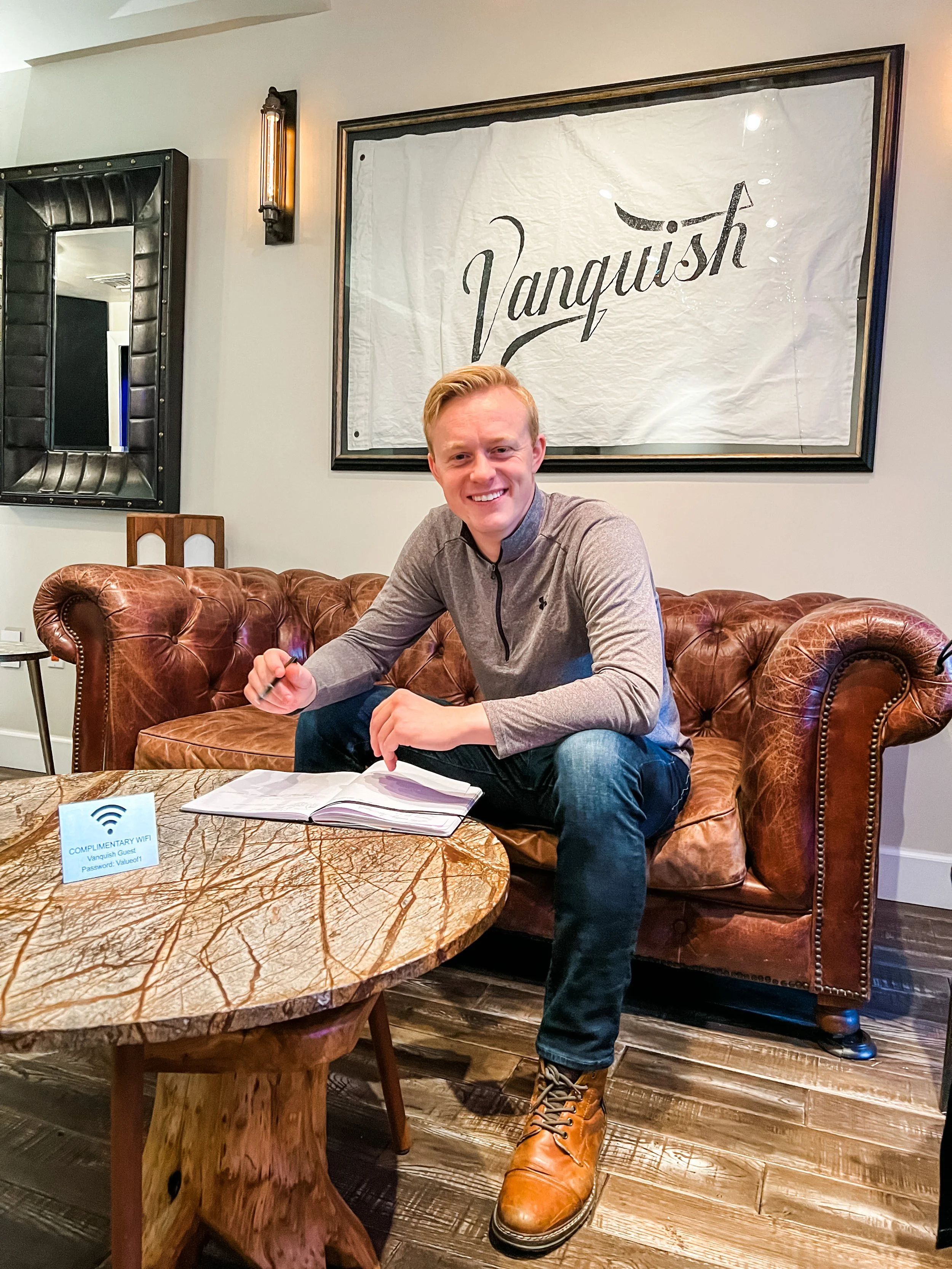 Darrien Sparks, owner and creator of Truth Radio, working at Vanquish Studios shooting a documentary on Joseph Salamida, Owner and Founder of Vanquish Studios.