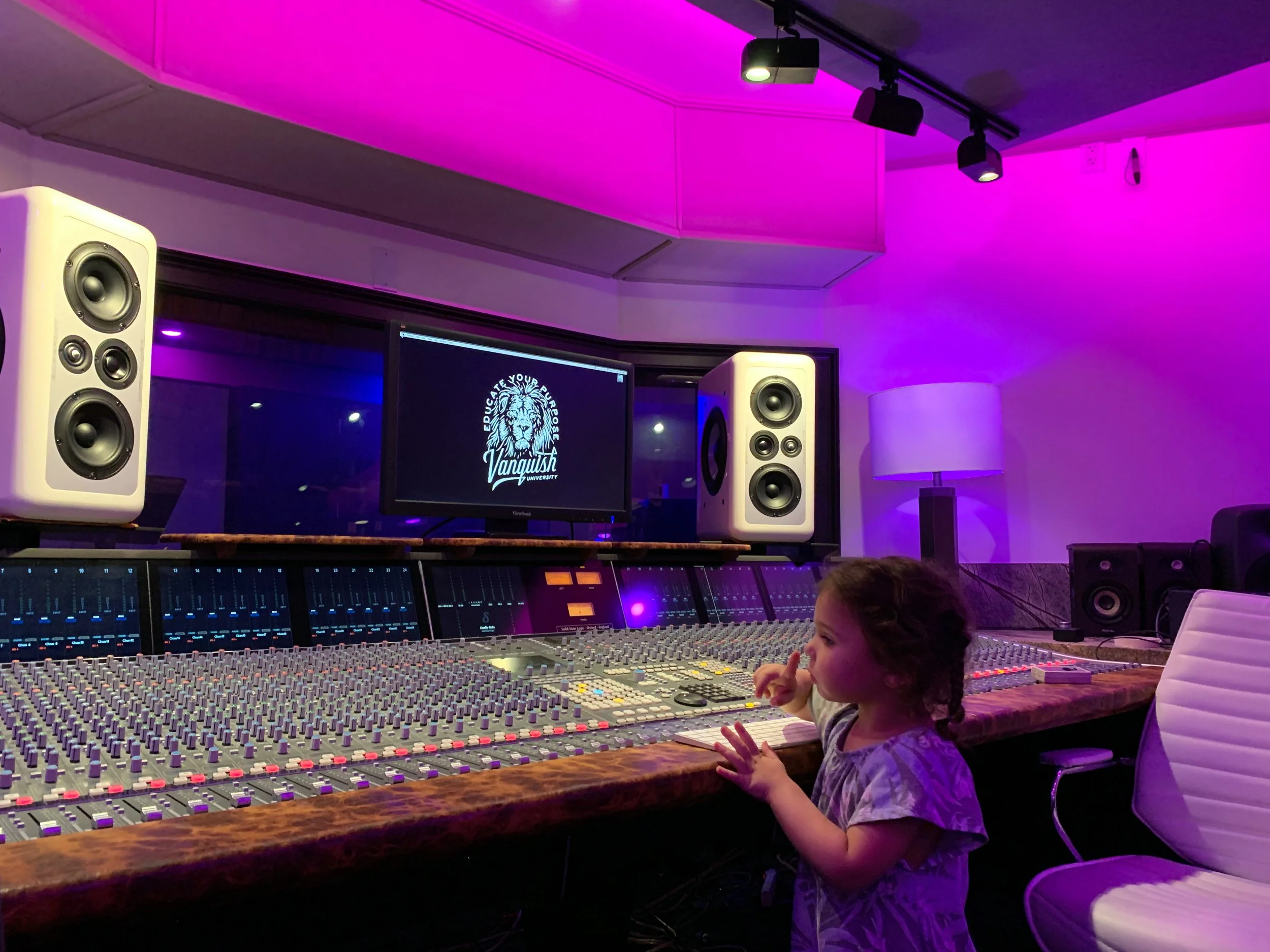 Sloane Salamida Engineering at Vanquish Studios on the Solid State Logic Duality. She is using custom white Barefoot MM26 monitors. 