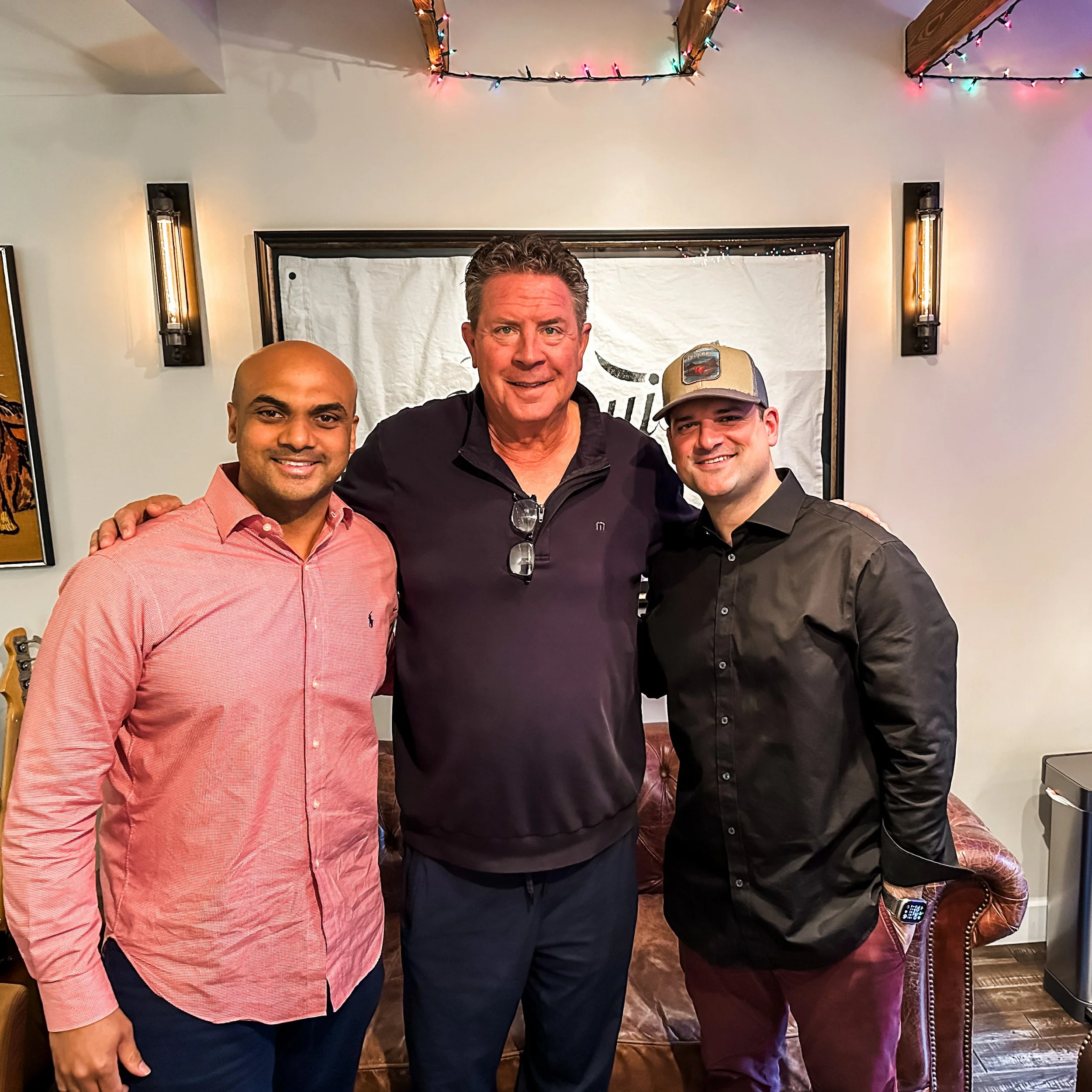 Shaun Hixon, Dan Marino, and Joseph Salamida hanging in the Vanquish Studios Lounge. Dan Marino played for the NFL as quarterback of The Miami Dolphins. 
