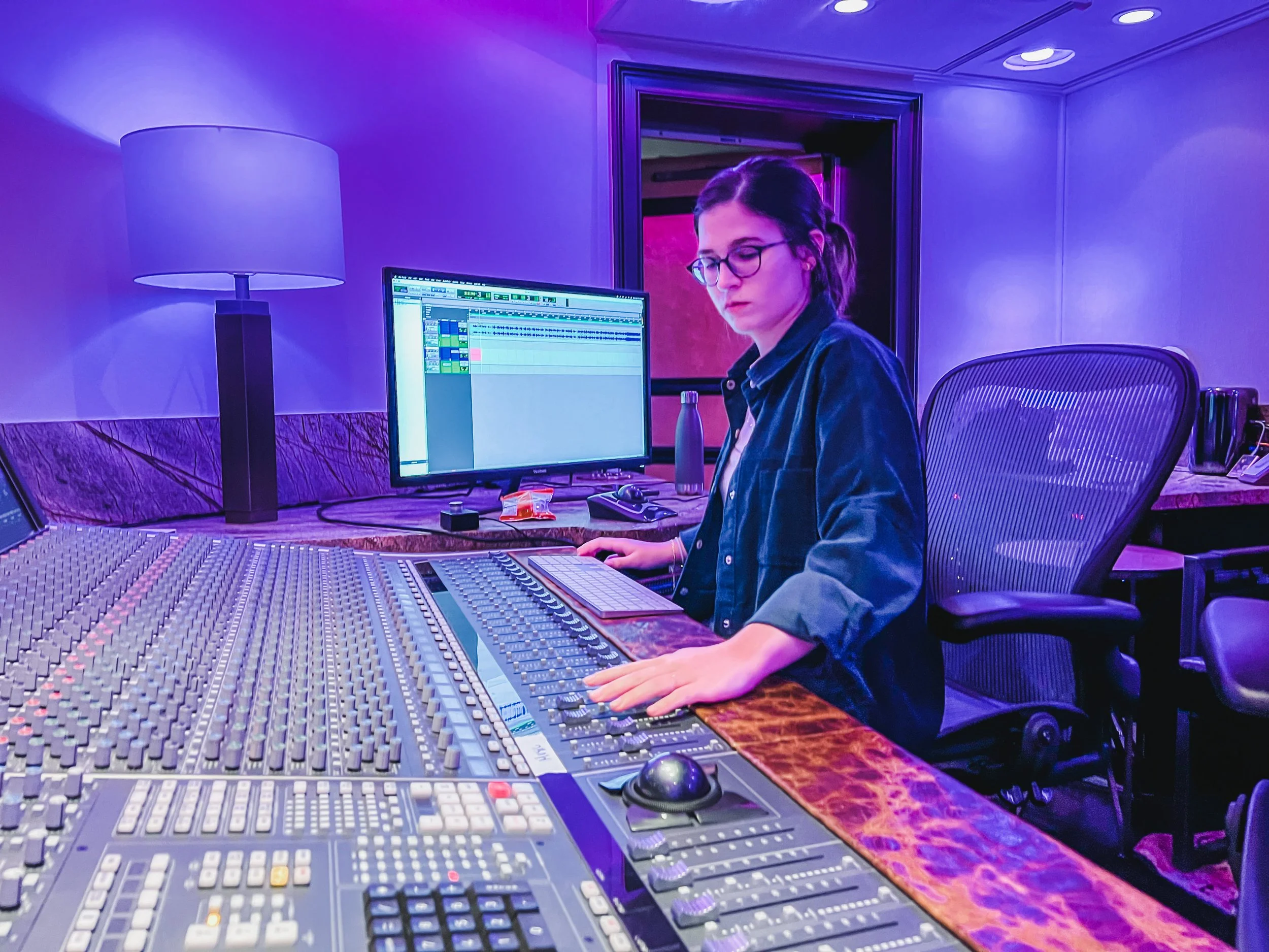 Tiffany Vera engineering at Vanquish Studios on the Solid State Logic Duality. Tiffany is a Berklee Graduate, worked as the studio manager and main engineer at Vanquish Studios for a season before moving to Washington DC, joining the audio team at NP