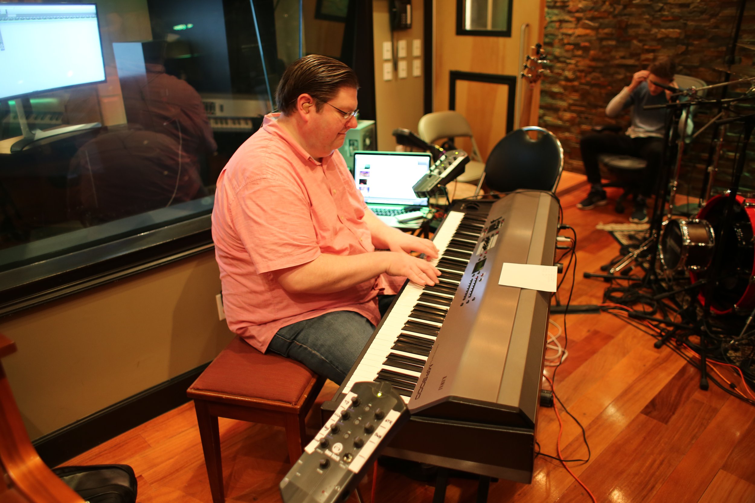 Aaron Curtis recording piano at Vanquish Studios 