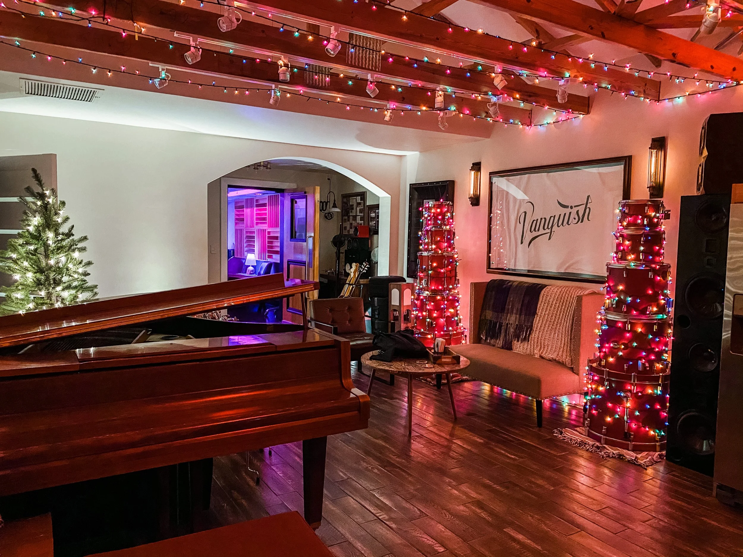 The Vanquish Studios Lounge at Christmas Time, featuring the G Series Yamaha Baby Grand.
