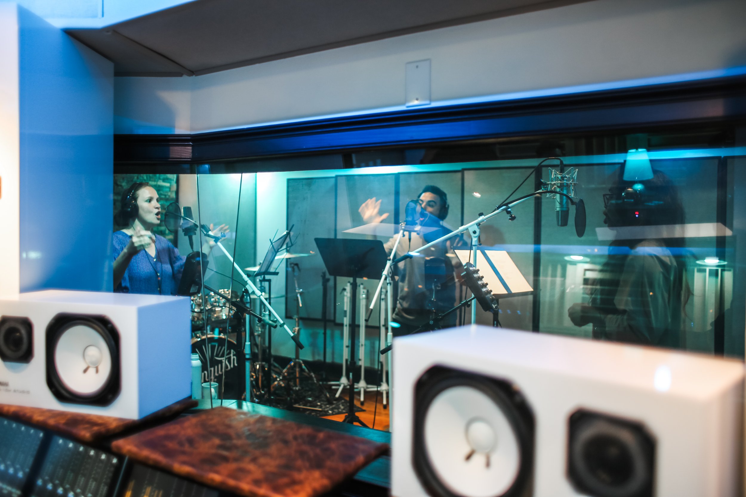 Nicole Morales, Jonathan Morales, and Brittani Campbell recording at Vanquish Studios