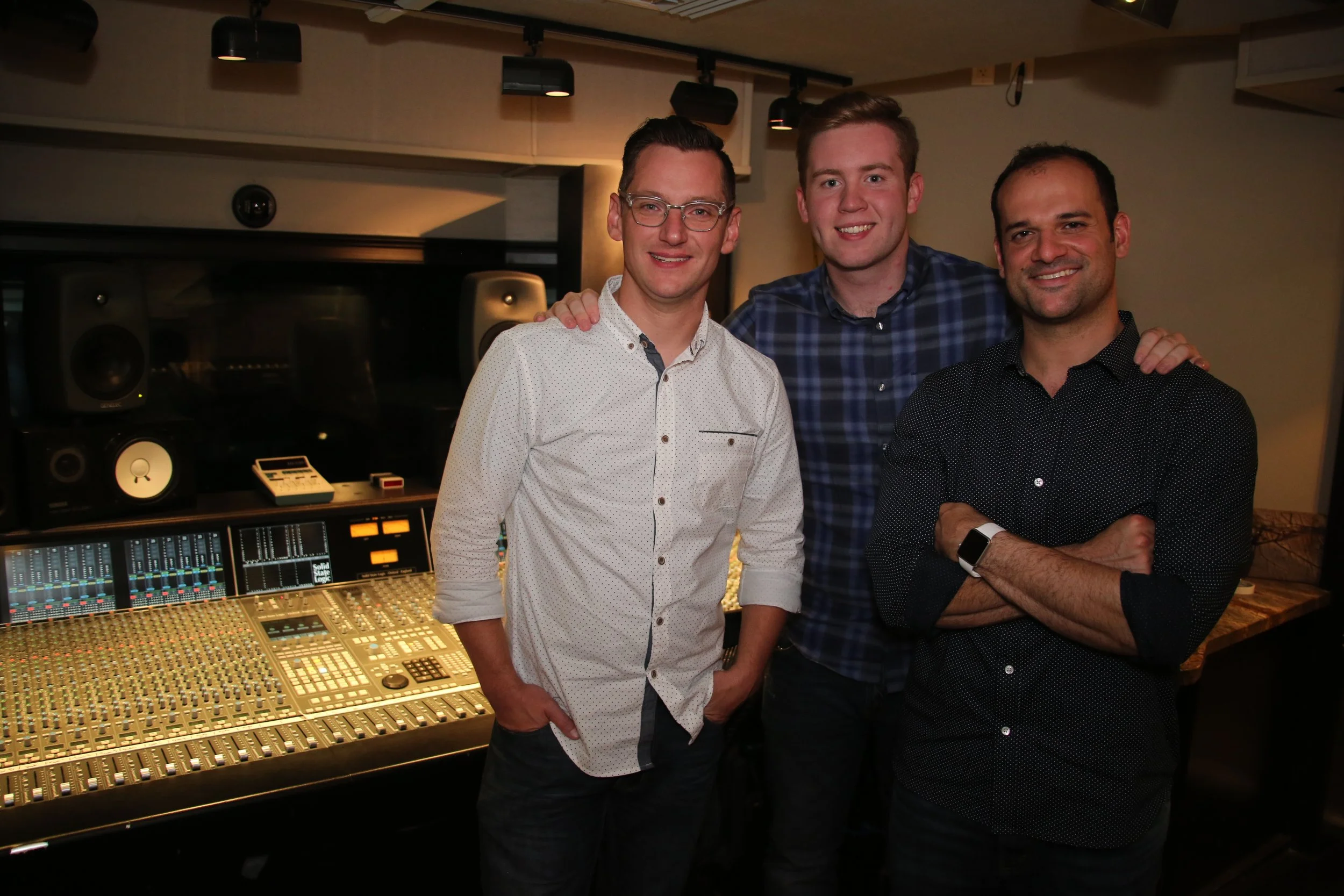 Andy Ferguson, Brett Grubbs, and Joseph Salamida working at Vanquish Studios.