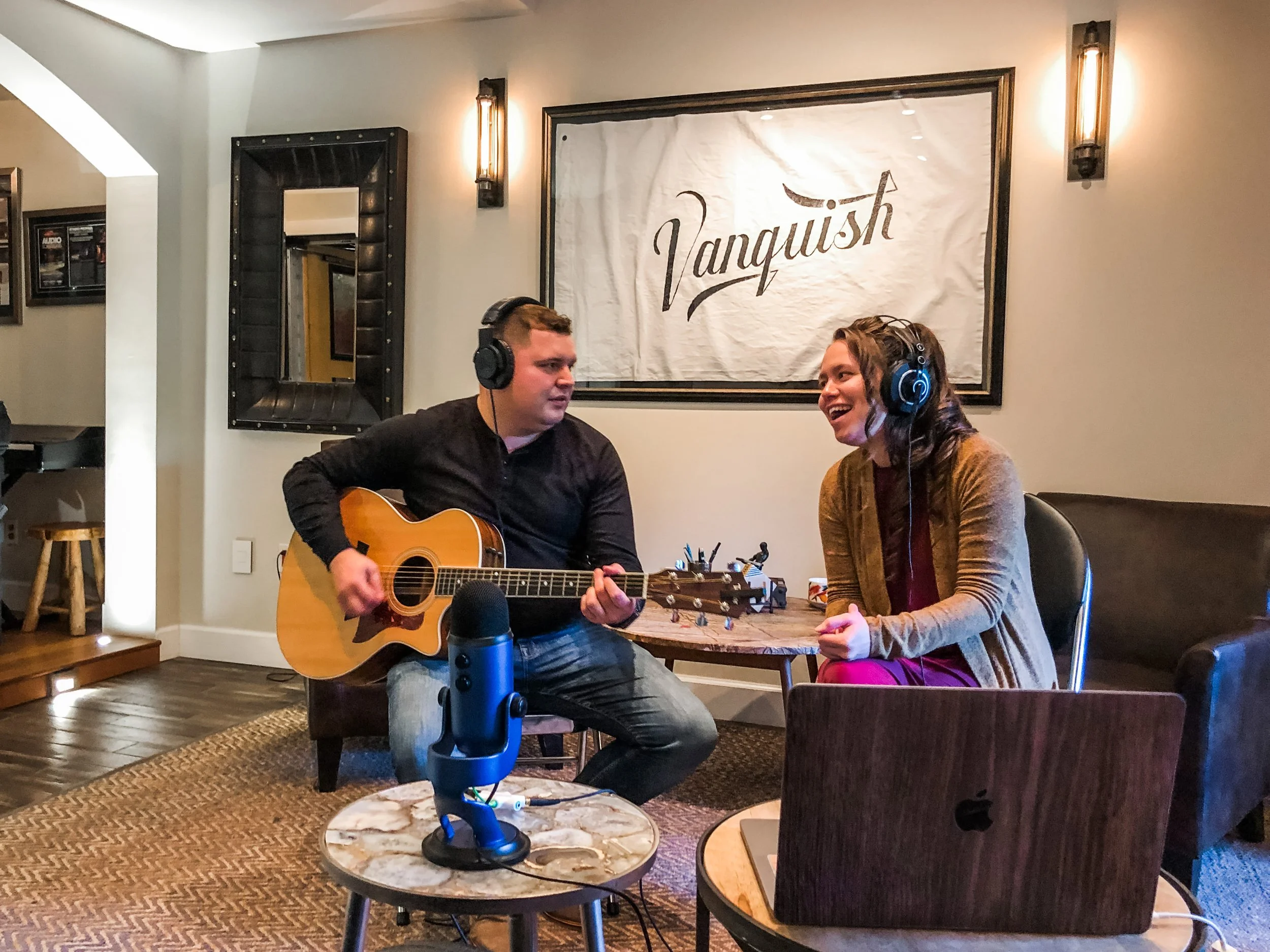 Nathan and Rachel French recording a live performance on livestream for a concert at the Vanquish Studios lounge.