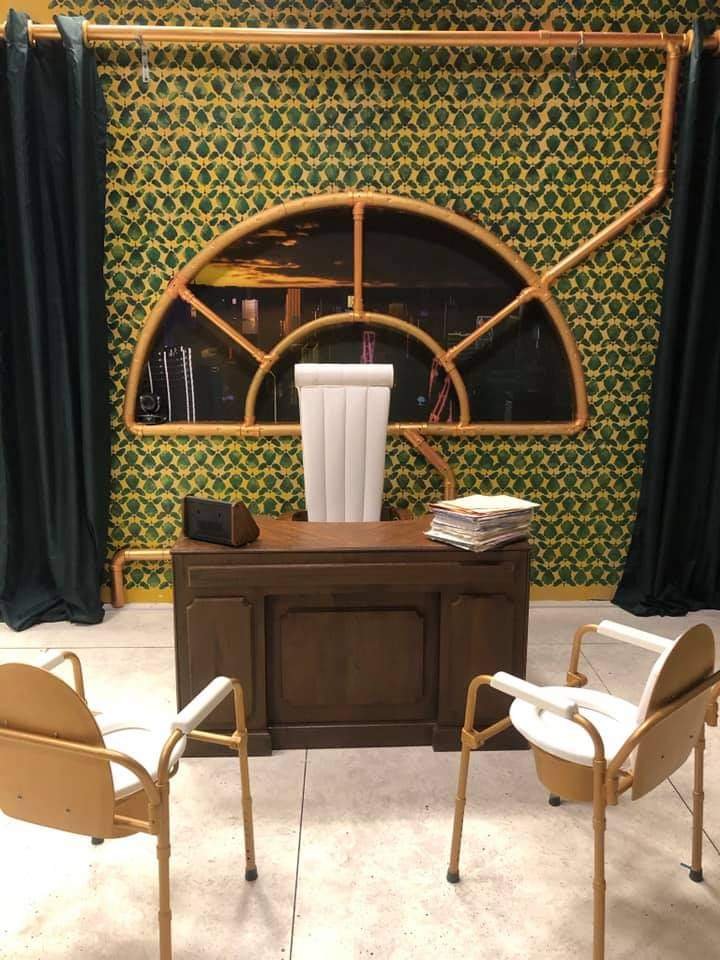 UGC office with toilet/plumbing motifs