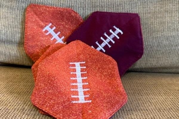 Football with Burgundy Coasters