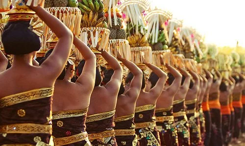 Balinese temple offerings and palm leaf decorations during Galungan, captured near SKY Yoga and Meditation in Ubud, representing spiritual devotion and the practice of Yoga off the mat.