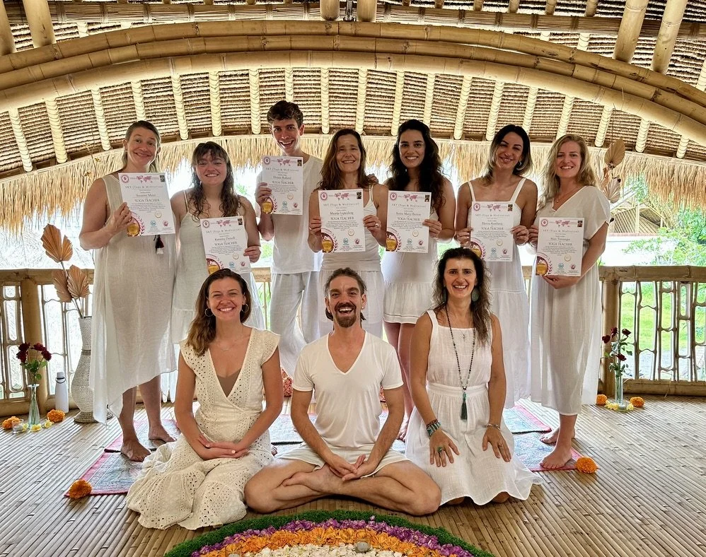 Students practising traditional Hatha Yoga in the bamboo shala during the most authentic Yoga Teacher Training in Bali at SKY Yoga and Meditation