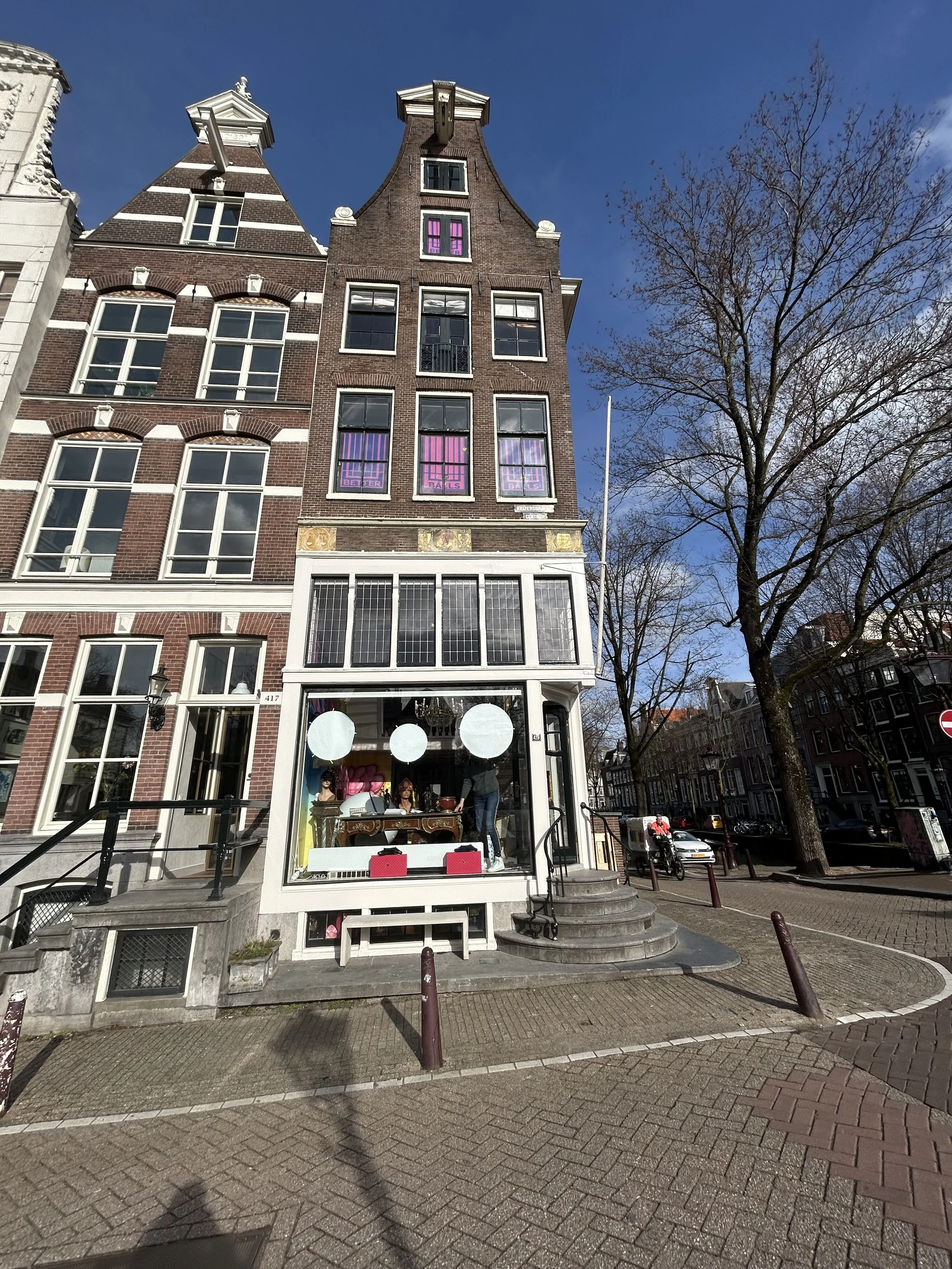 Street-facing art exhibition on Keizersgracht Amsterdam