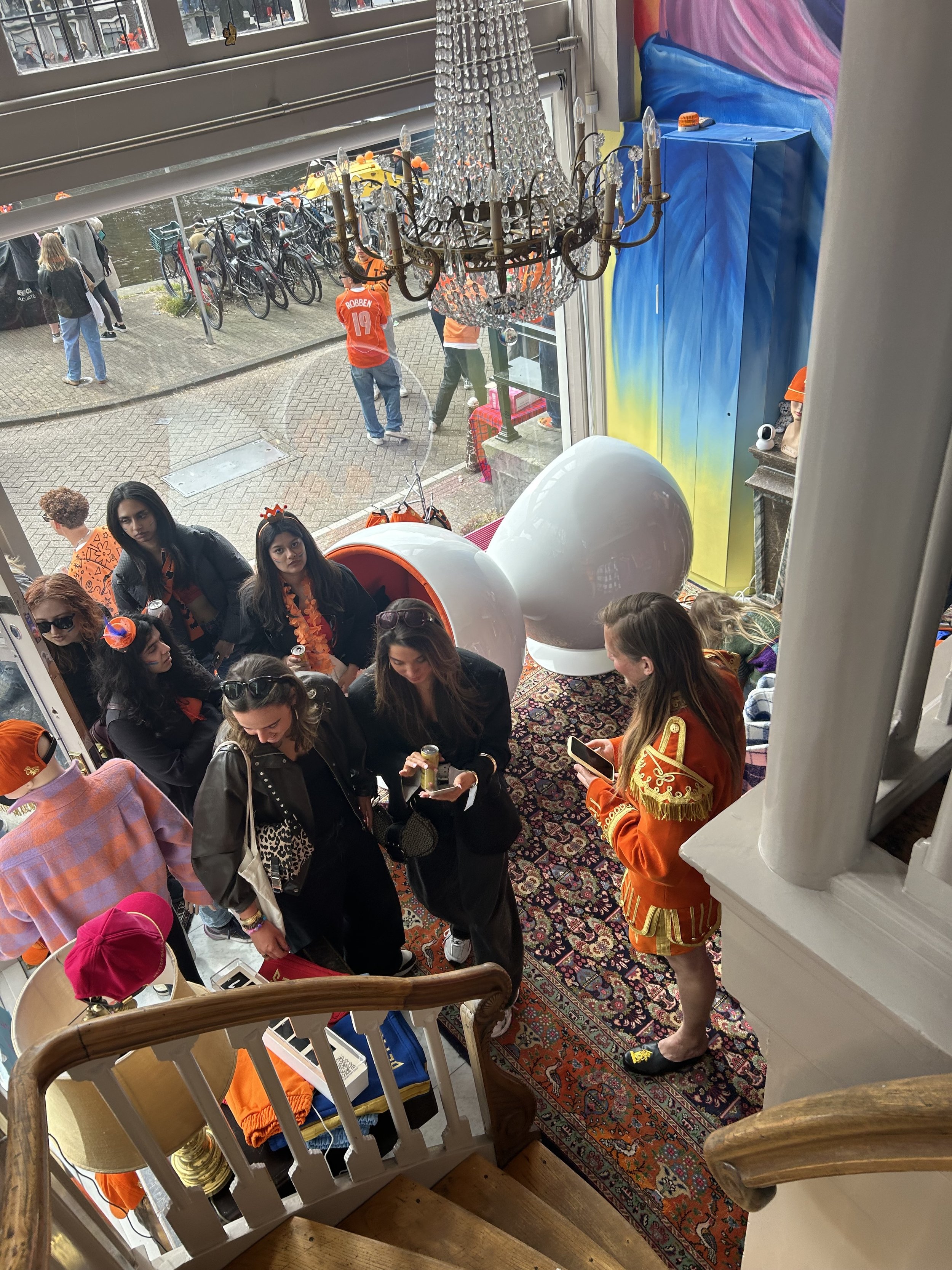 King’s Day crowd lining up outside the BETTER BÅLLS showroom on Keizersgracht in Amsterdam