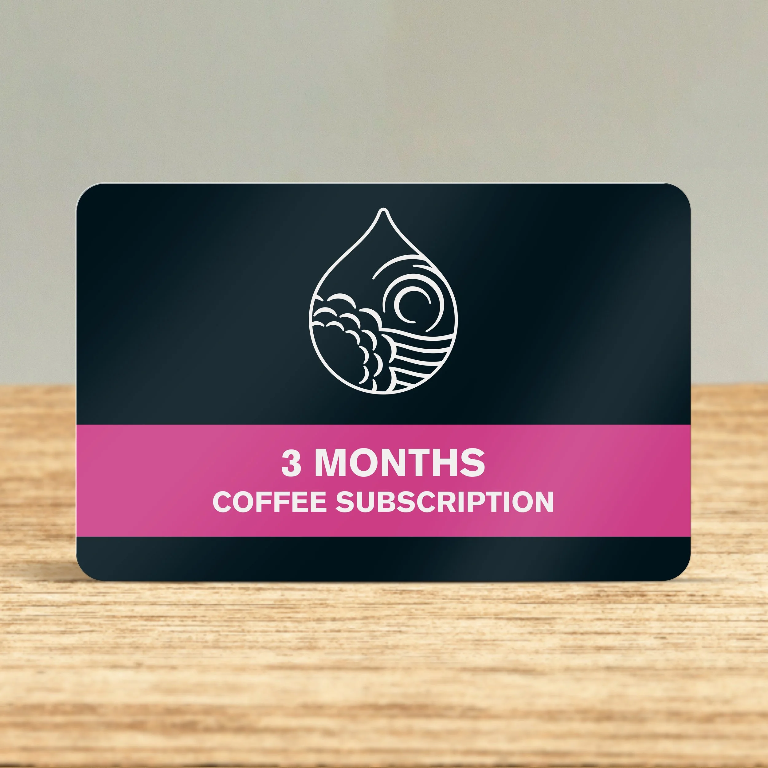 Bean Shot 3 month coffee bean subscription card on wooden counter