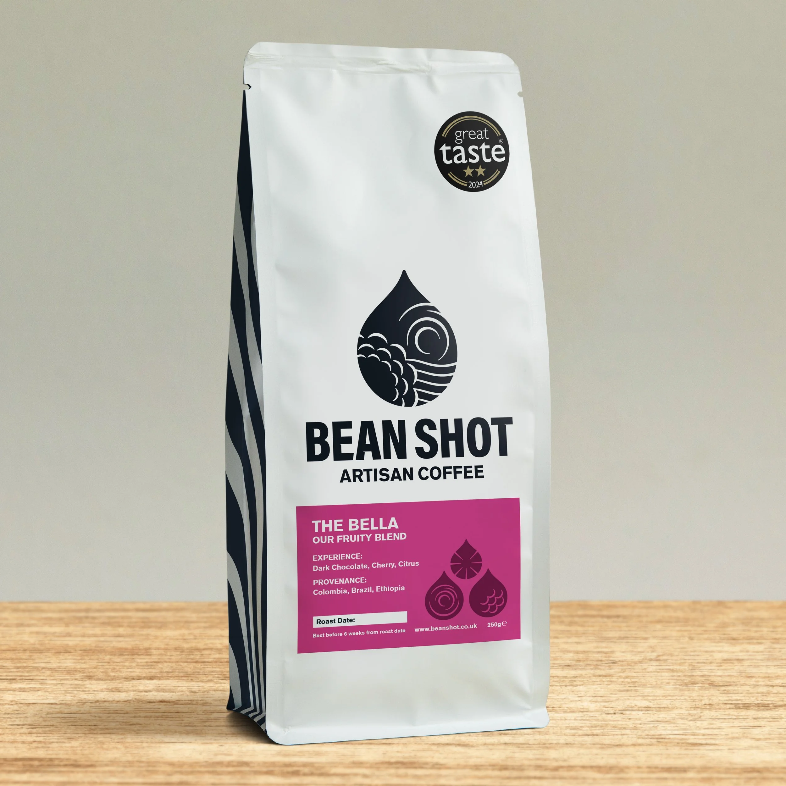 The Bella Bean shot artisan roasted and sustainable bag of whole bean and ground coffee shown at home on counter