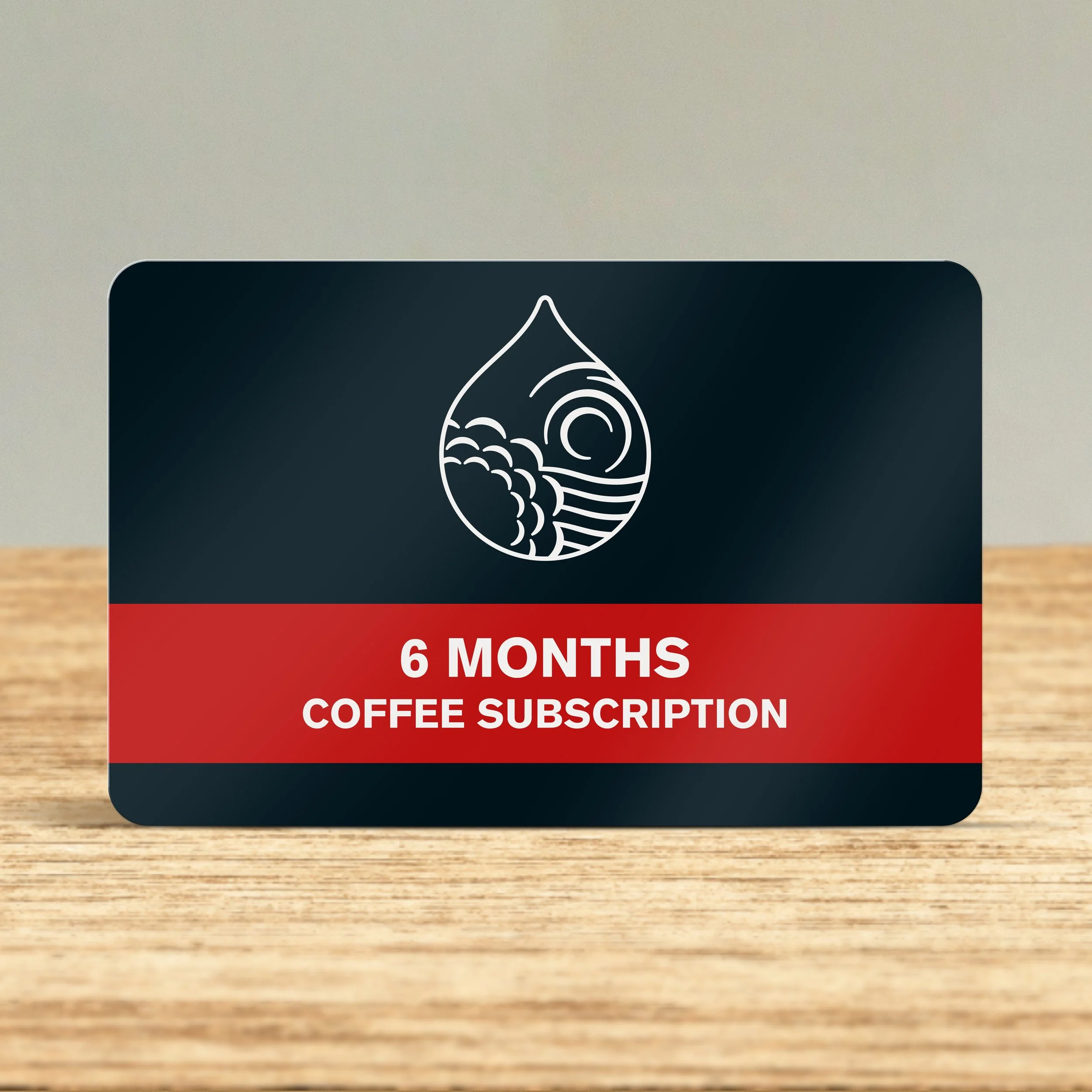 Bean Shot 6 month coffee bean subscription card on wooden counter