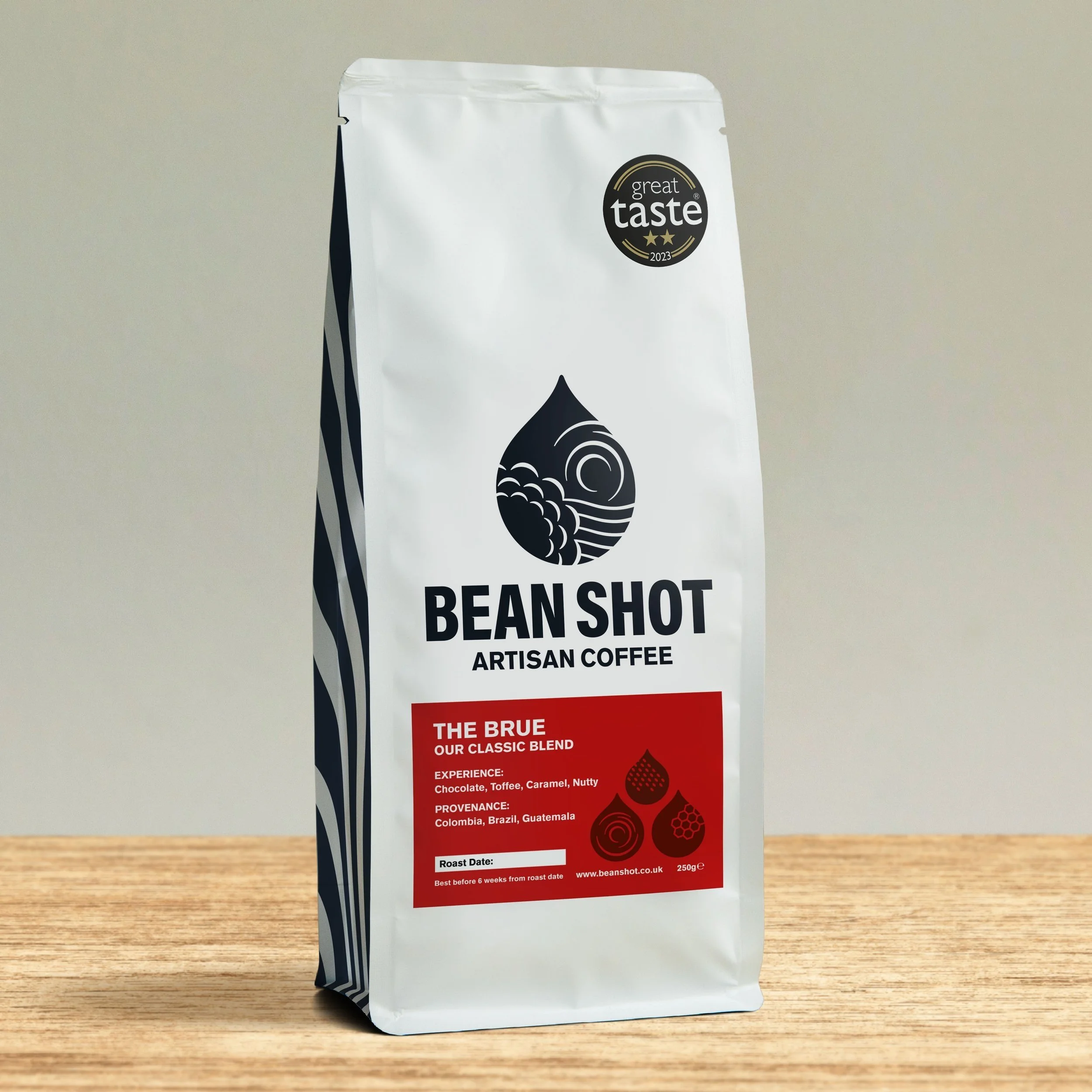The Brue Bean Shot artisan roasted and sustainable bag of whole bean and ground coffee shown at home on counter