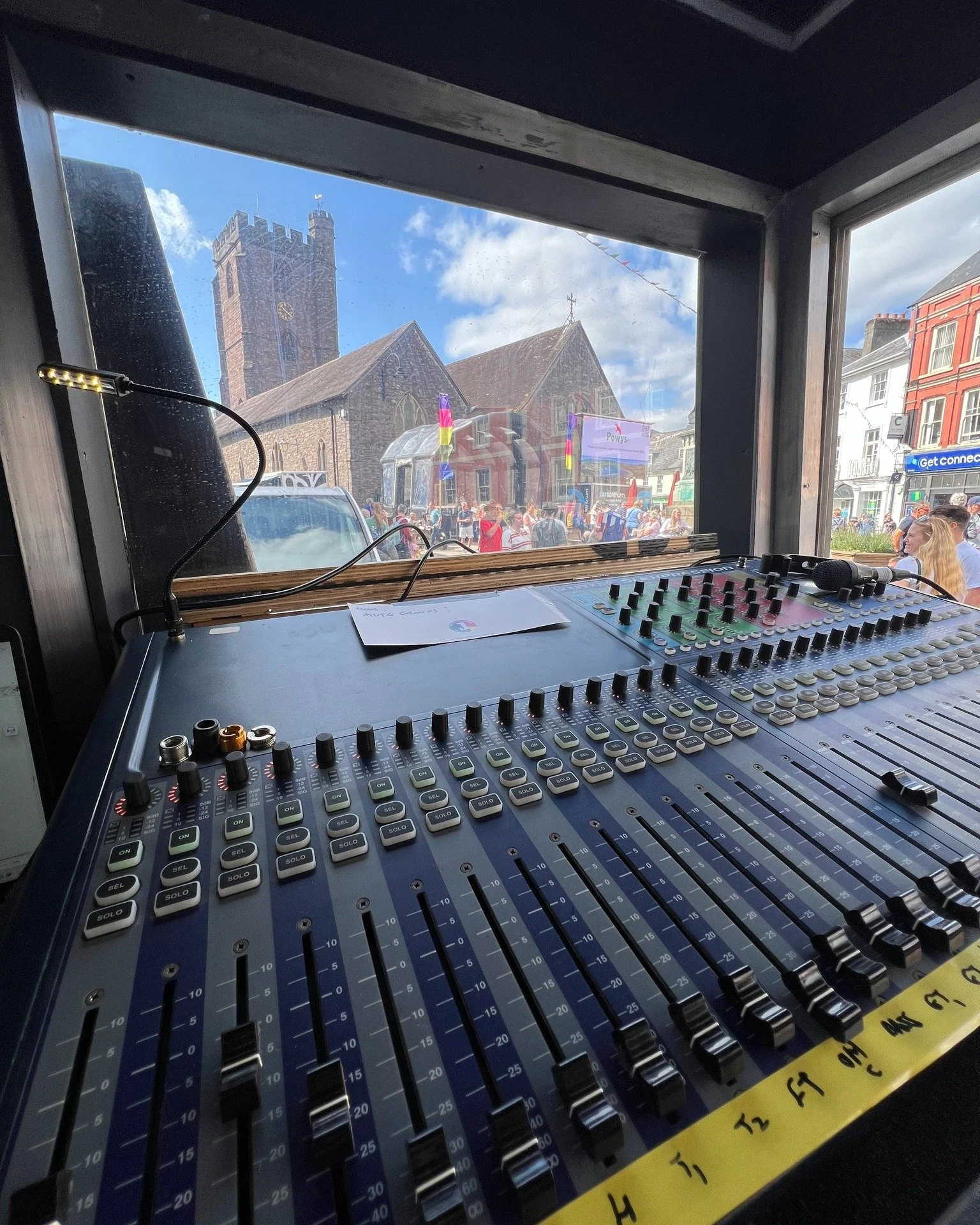 Mixing desk looking out on to Brecon Jazz Festival