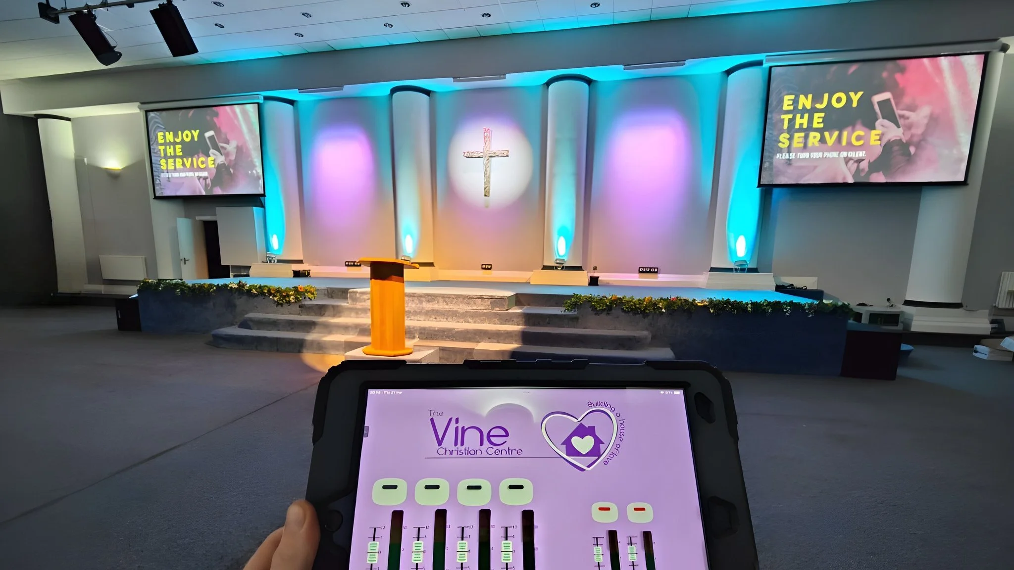 Touchscreen control of sound system and lighting installed with stage for a church in Bridgend