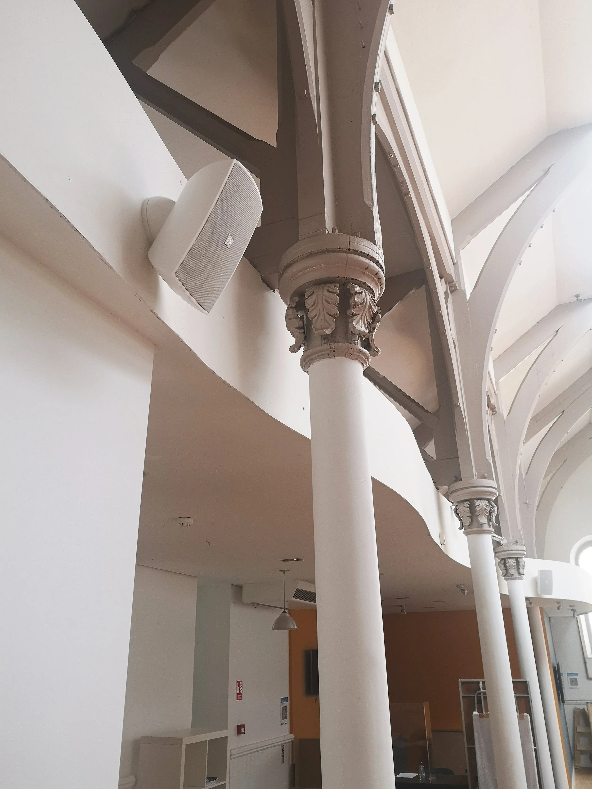 Audac Ateo6 speaker mounted in Ffotogallery Cardiff supplied by Spartan Audio