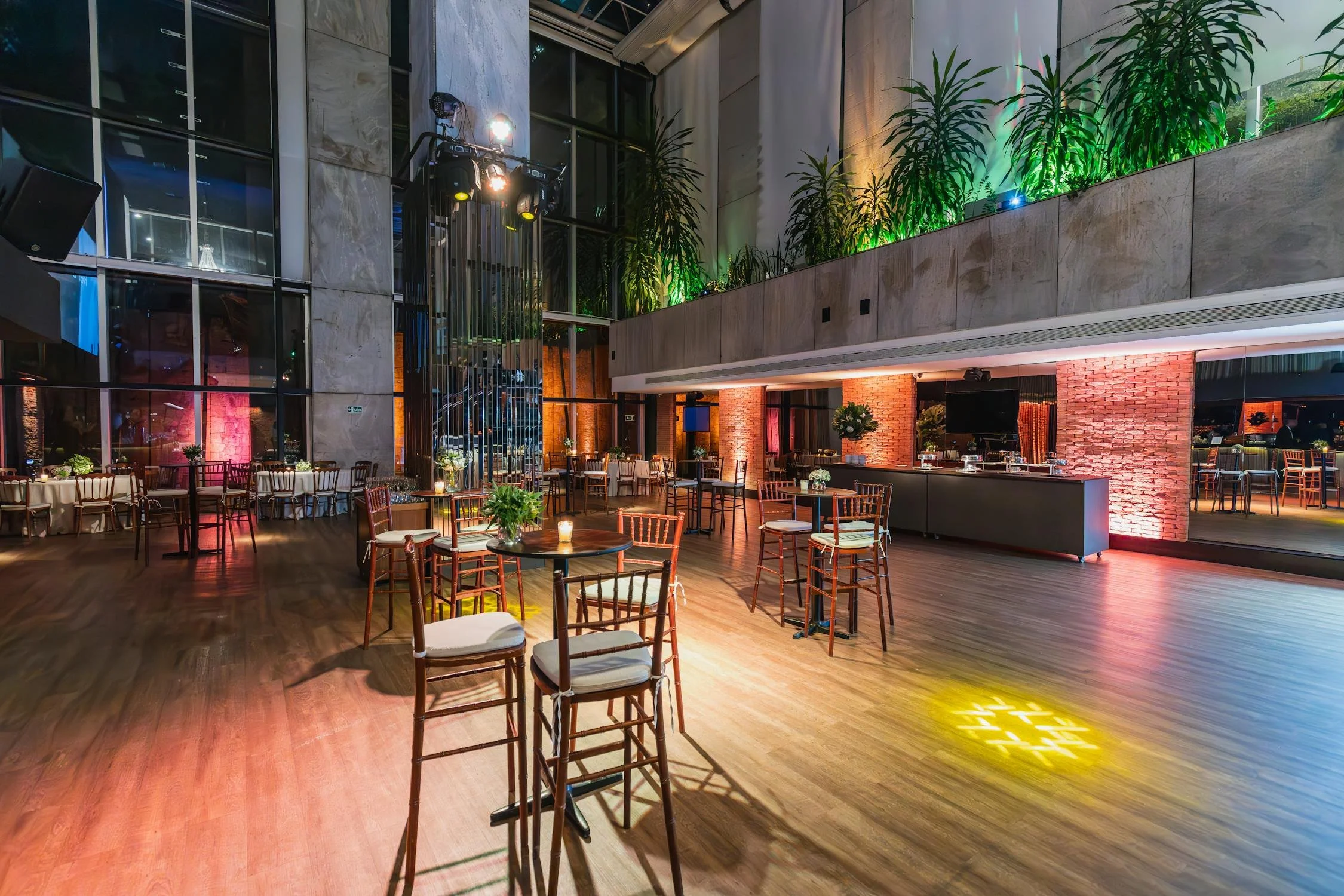 Modern hotel event space with tasteful lighting and AV
