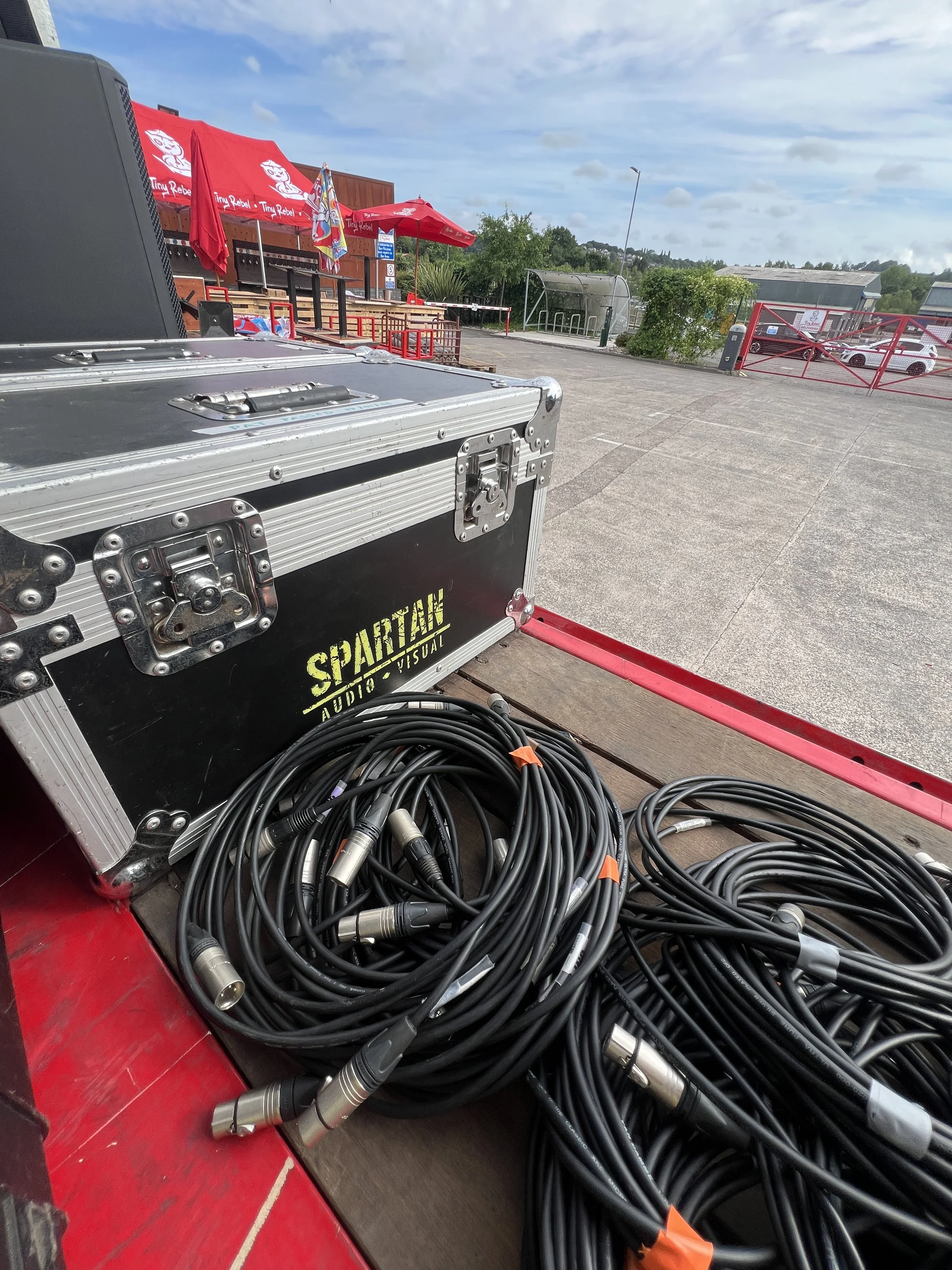 Flightcase and cables on the Trailer Stage at Tiny Rebel Fest provided by Spartan Audio Visual