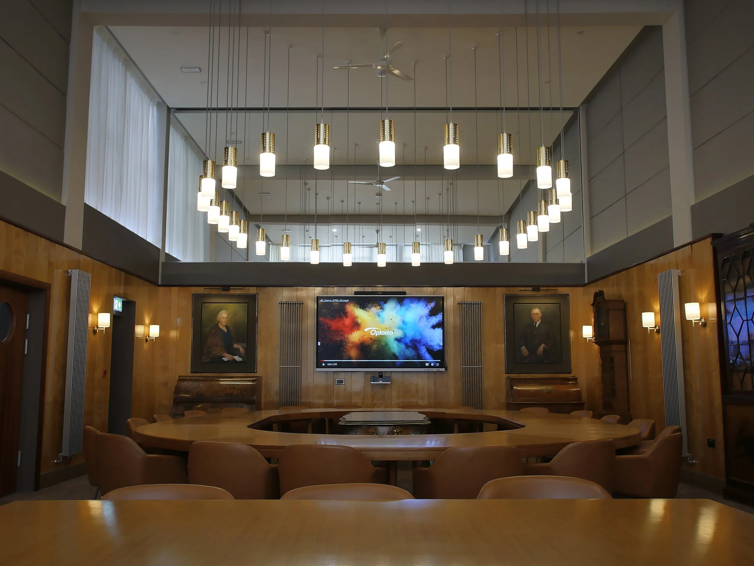 Touchscreen display technology installed by av installation company in boardroom. Audio Visual equipment sympathetically installed to architecture in Aberystwyth