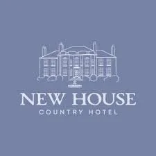 Logo of New House Country Hotel on a blue background.