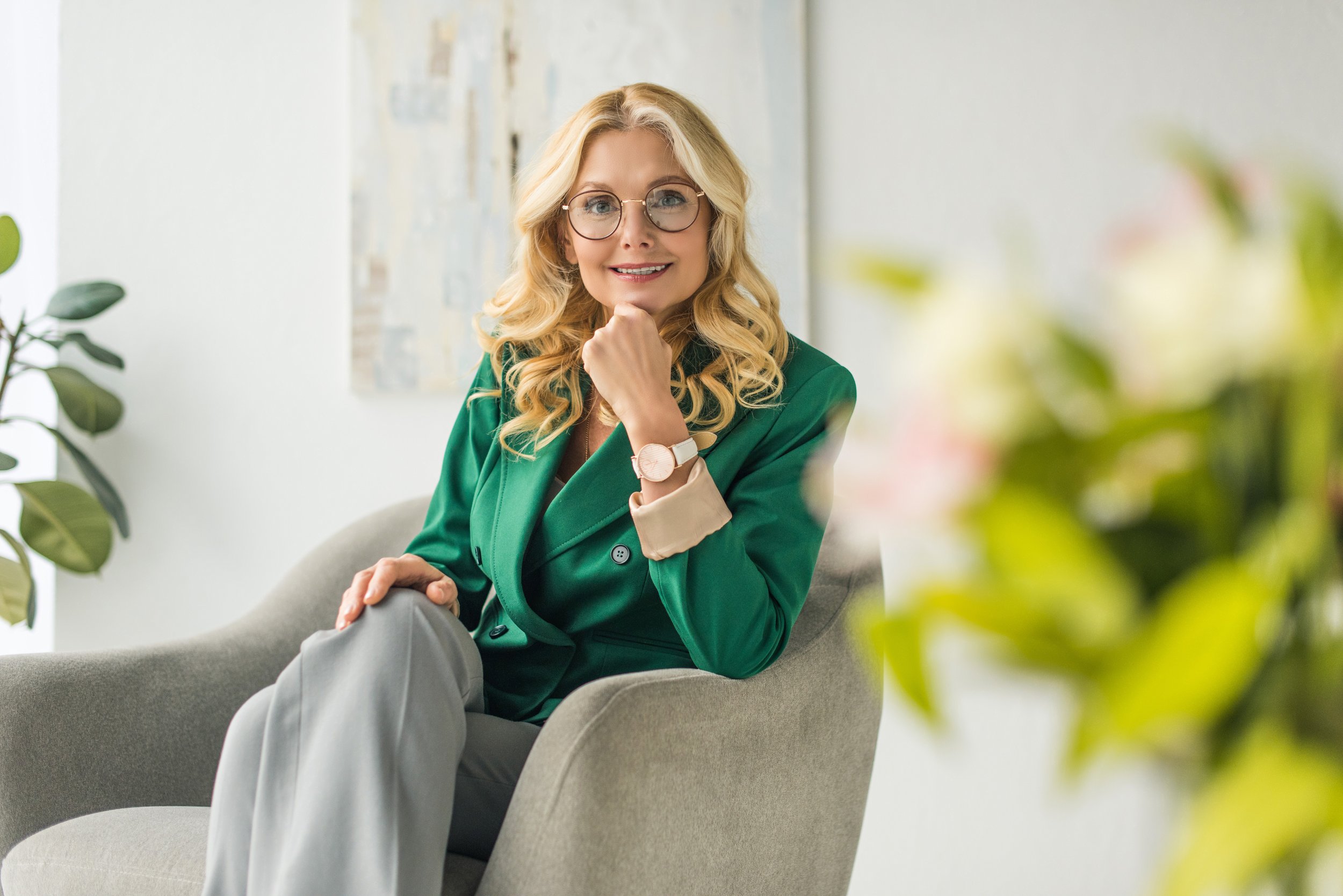 woman-wearing-green-blazer-sitting-in-gray-chair-2026-01-06-00-28-48-utc.jpg