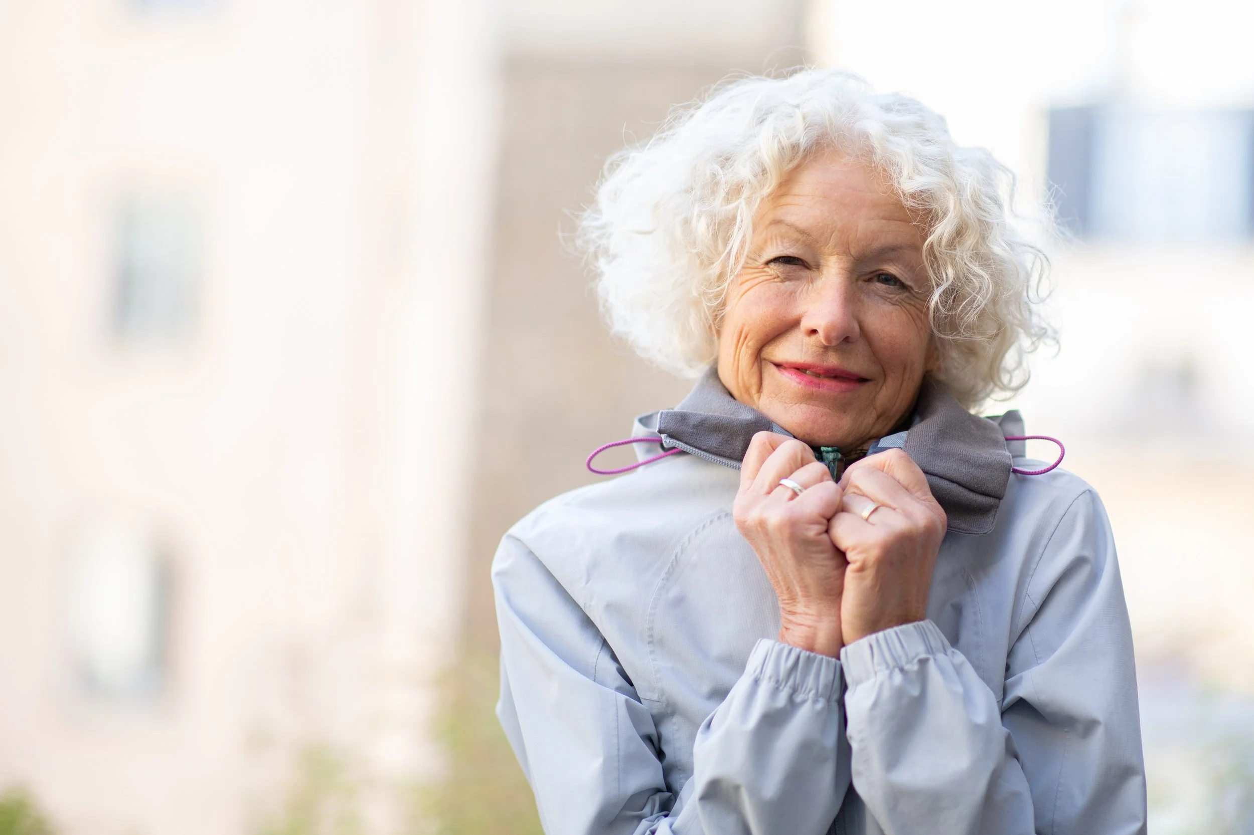 close-up-older-woman-cold-with-winter-jacket-2026-03-09-23-01-49-utc.jpg