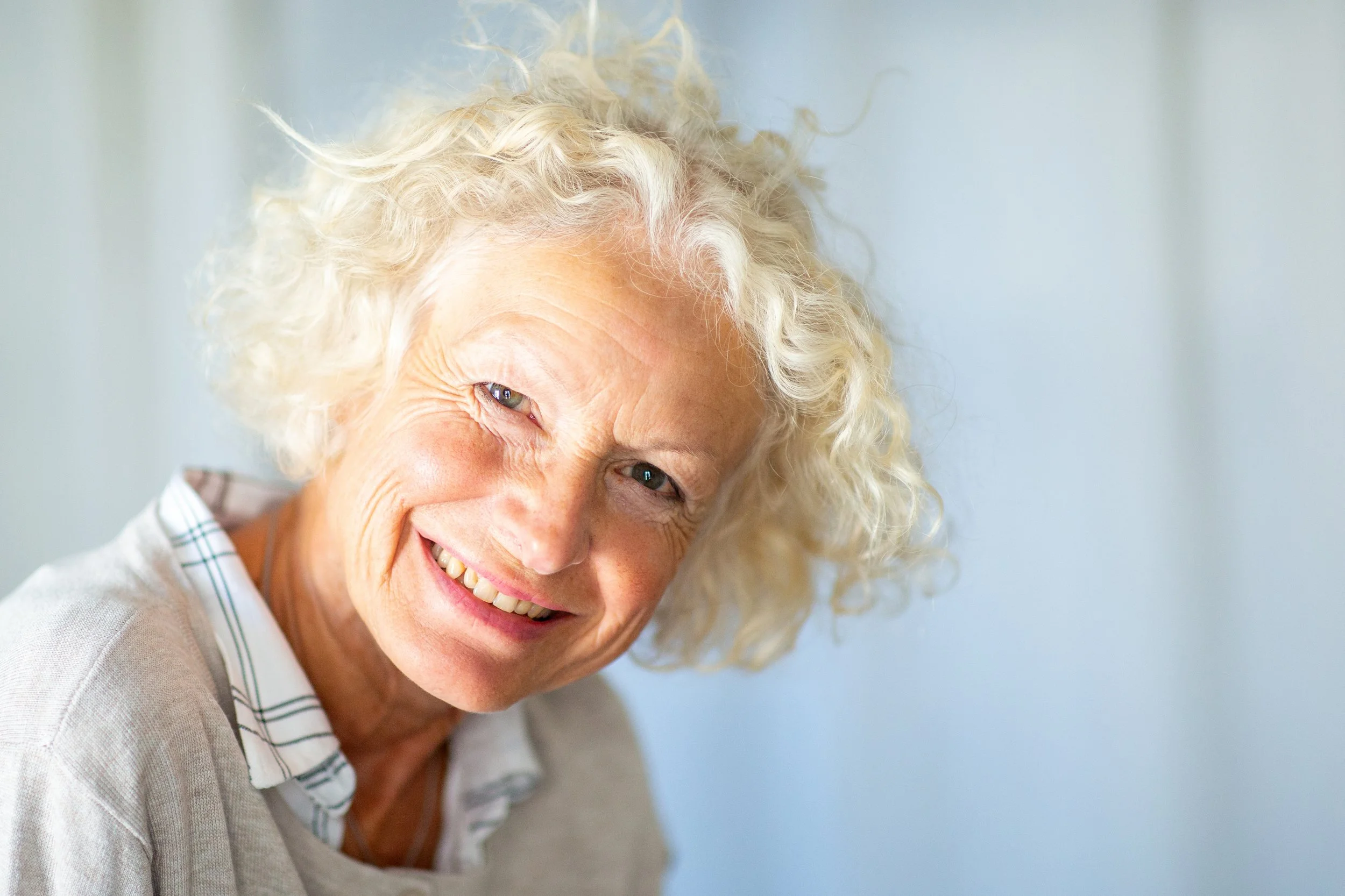 close-up-portrait-smiling-older-woman-2026-03-09-08-42-32-utc.jpg