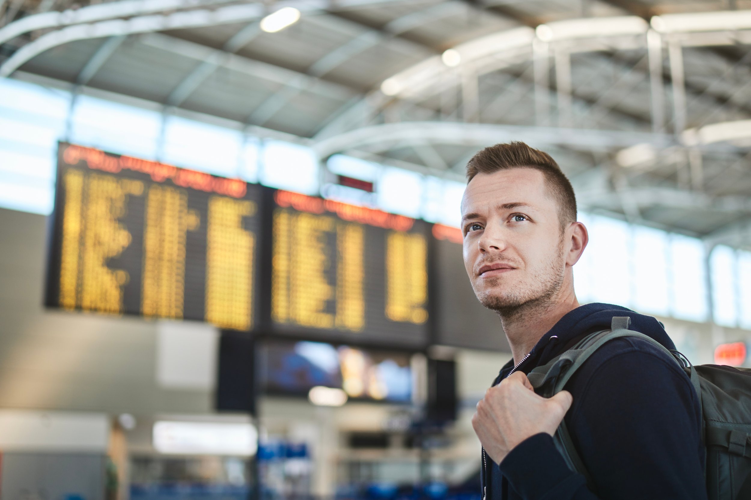 man-with-backpack-at-airport-portrait-of-tourist-2026-03-18-20-45-11-utc.jpg